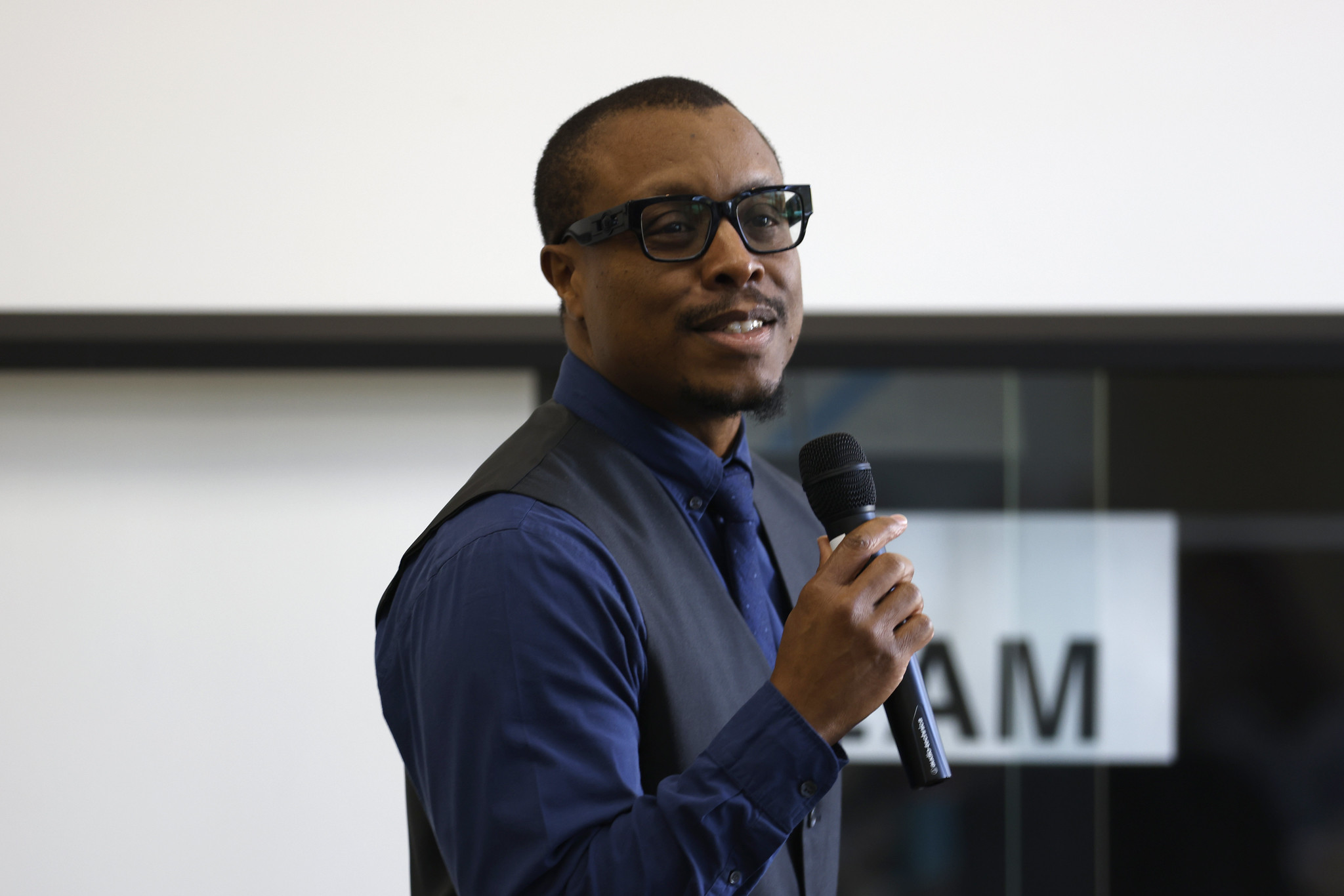 
Jared Burns, Vice Chancellor of People, Culture, and Technology speaks to the academy.
