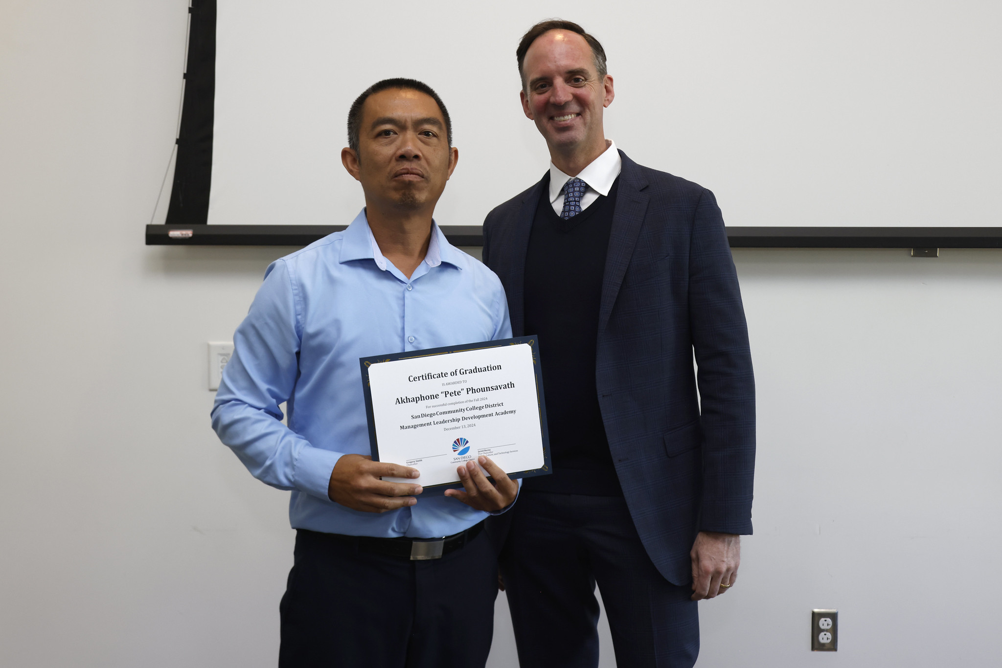 
Pete Phounsavath receives his certificate.
