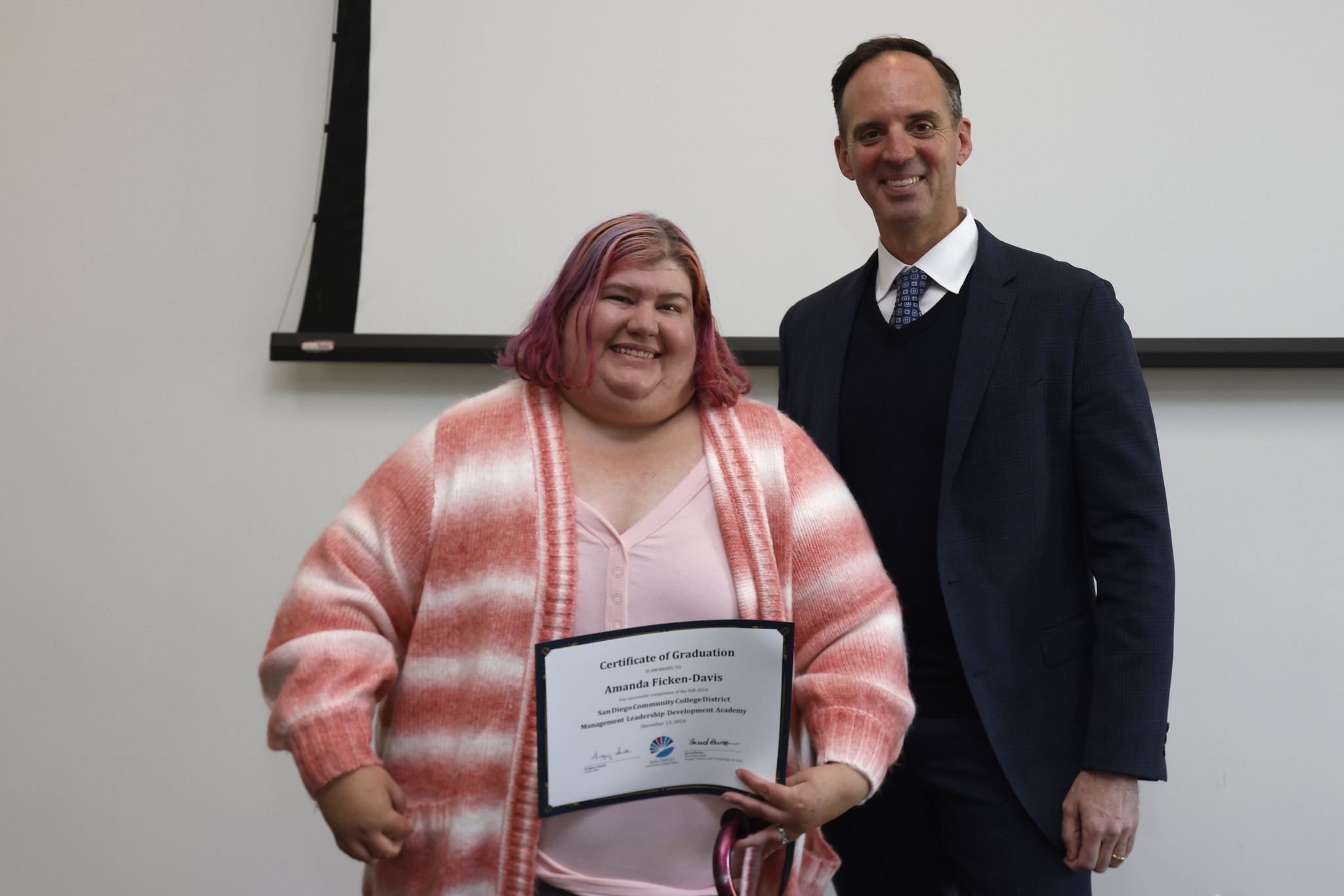 
Amanda Ficken-Davis receives her certificate.
