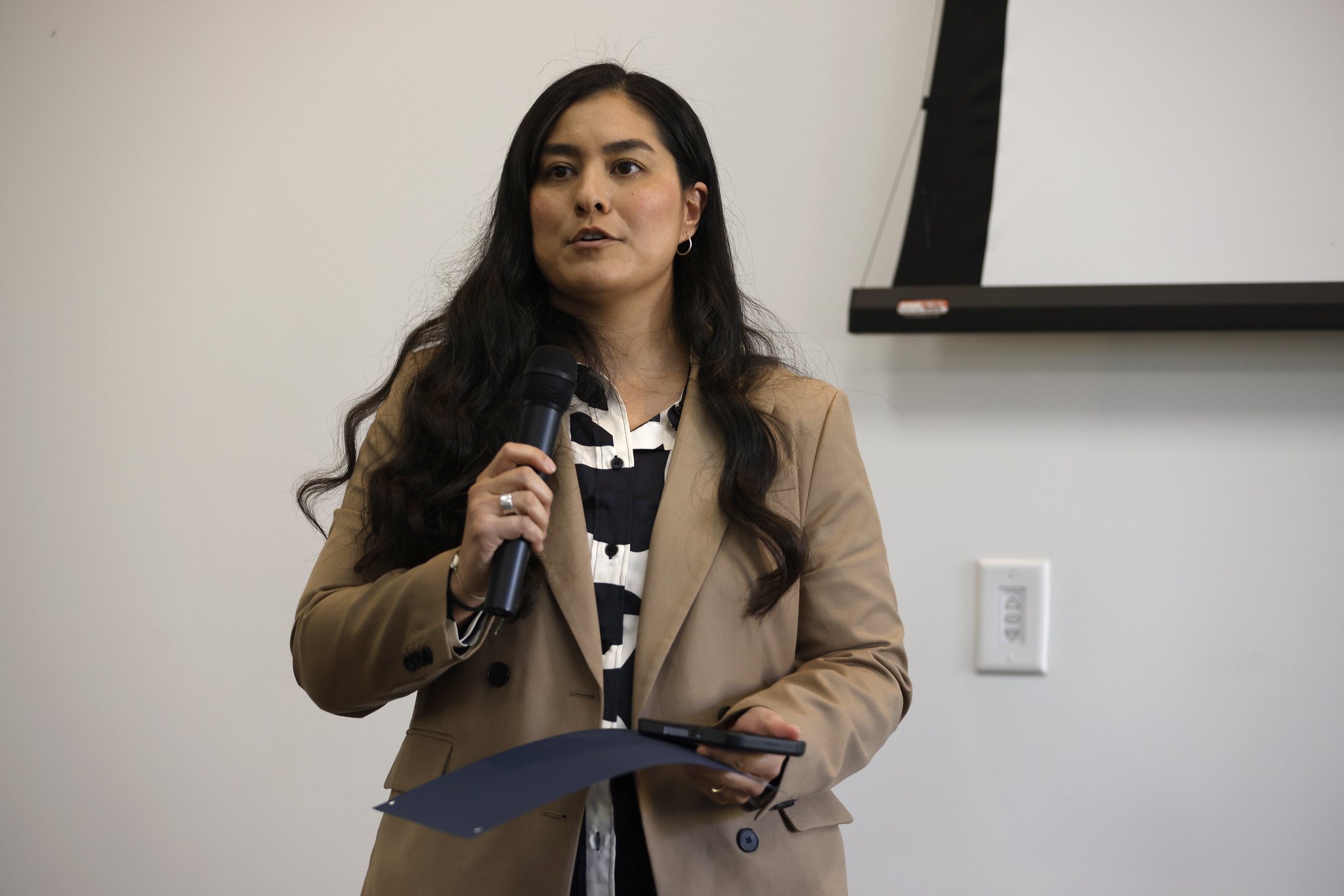 
Cassandra Hamel receives her certificate.
