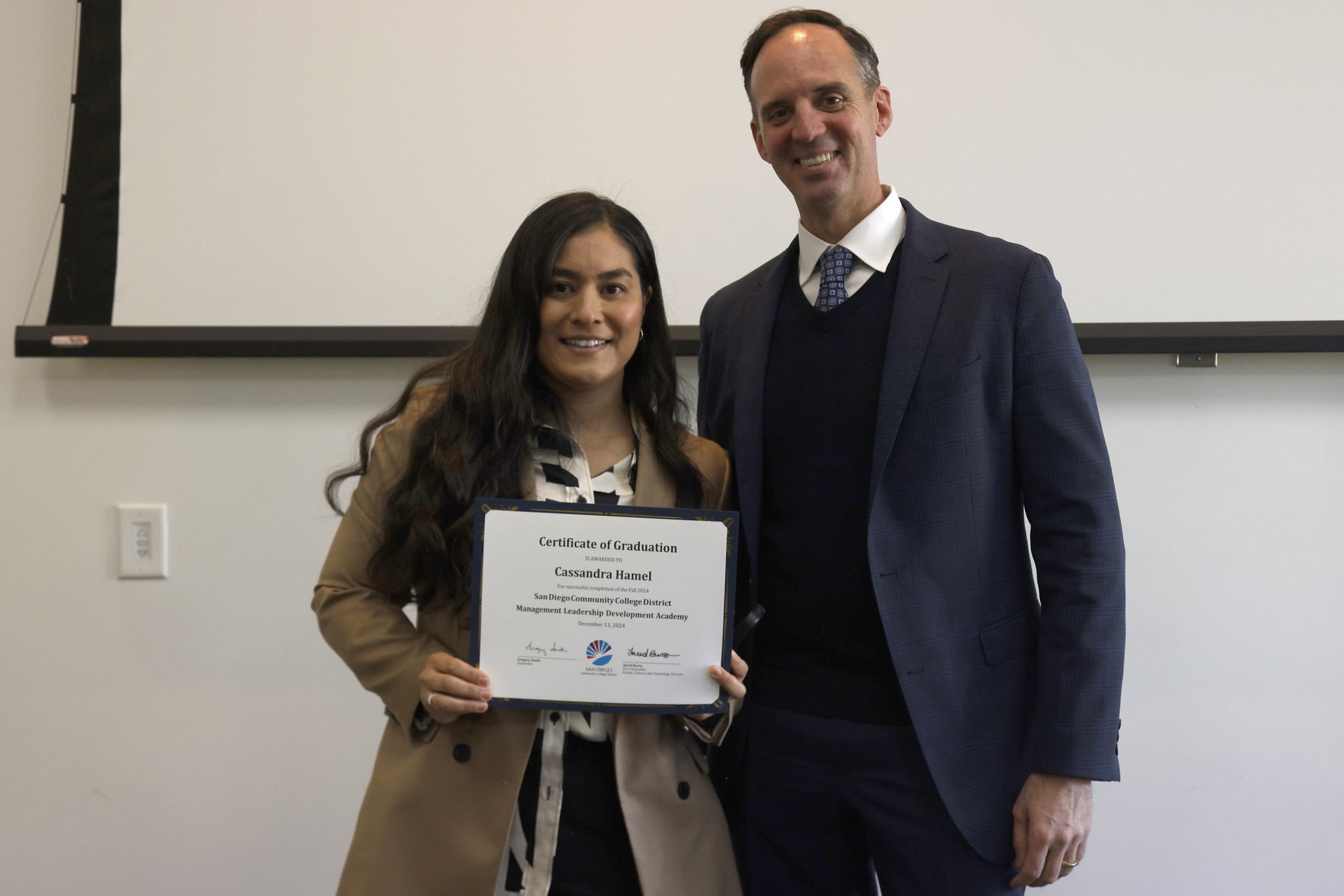 
Cassandra Hamel receives her certificate.
