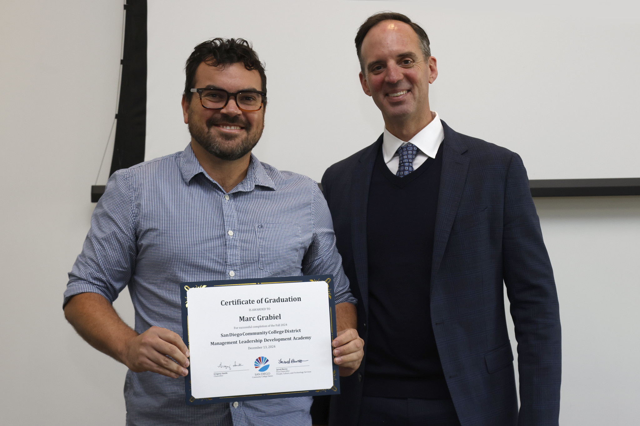 
Marc Grabiel receives his certificate.
