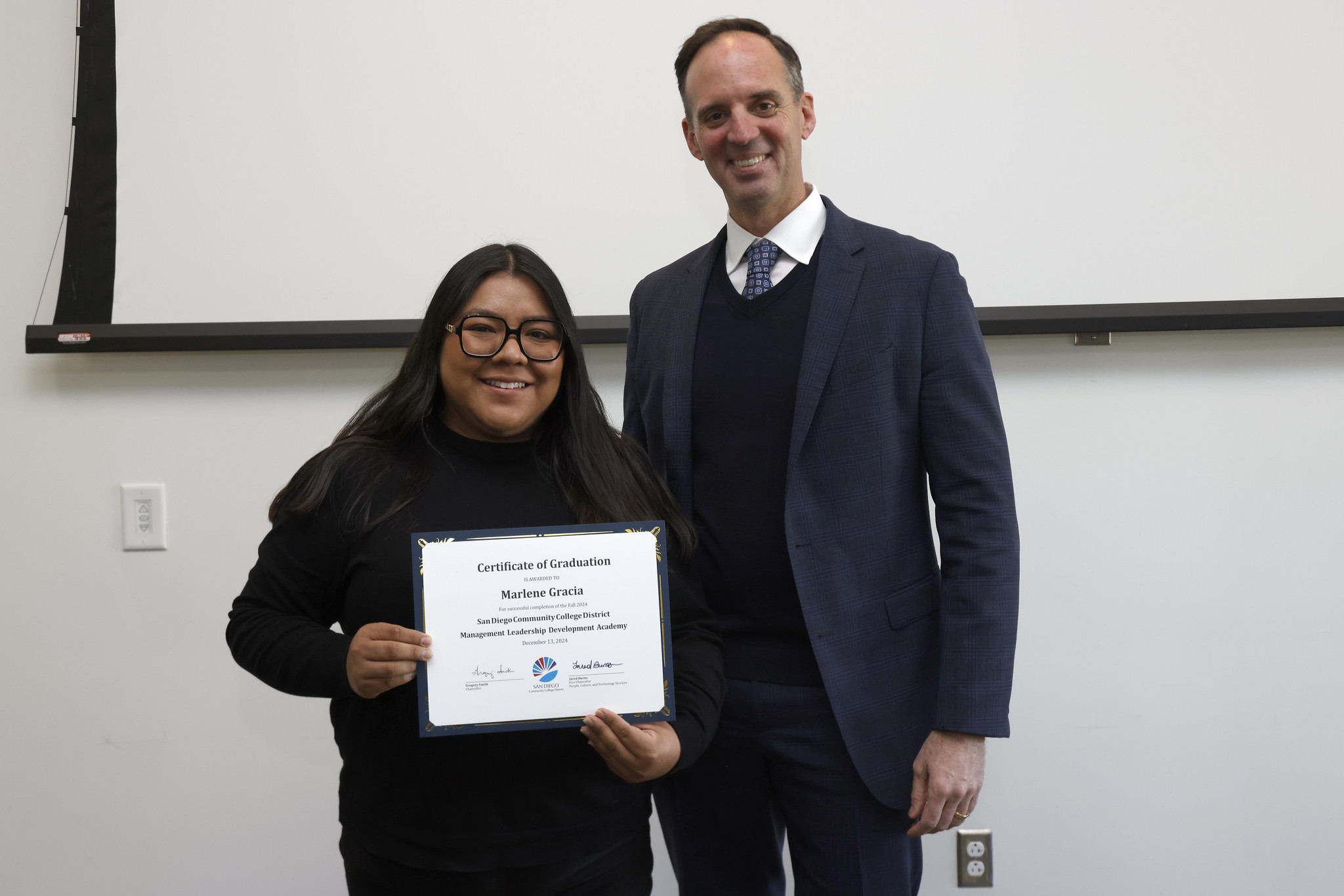 
Maxine Gracia receives her certificate.
