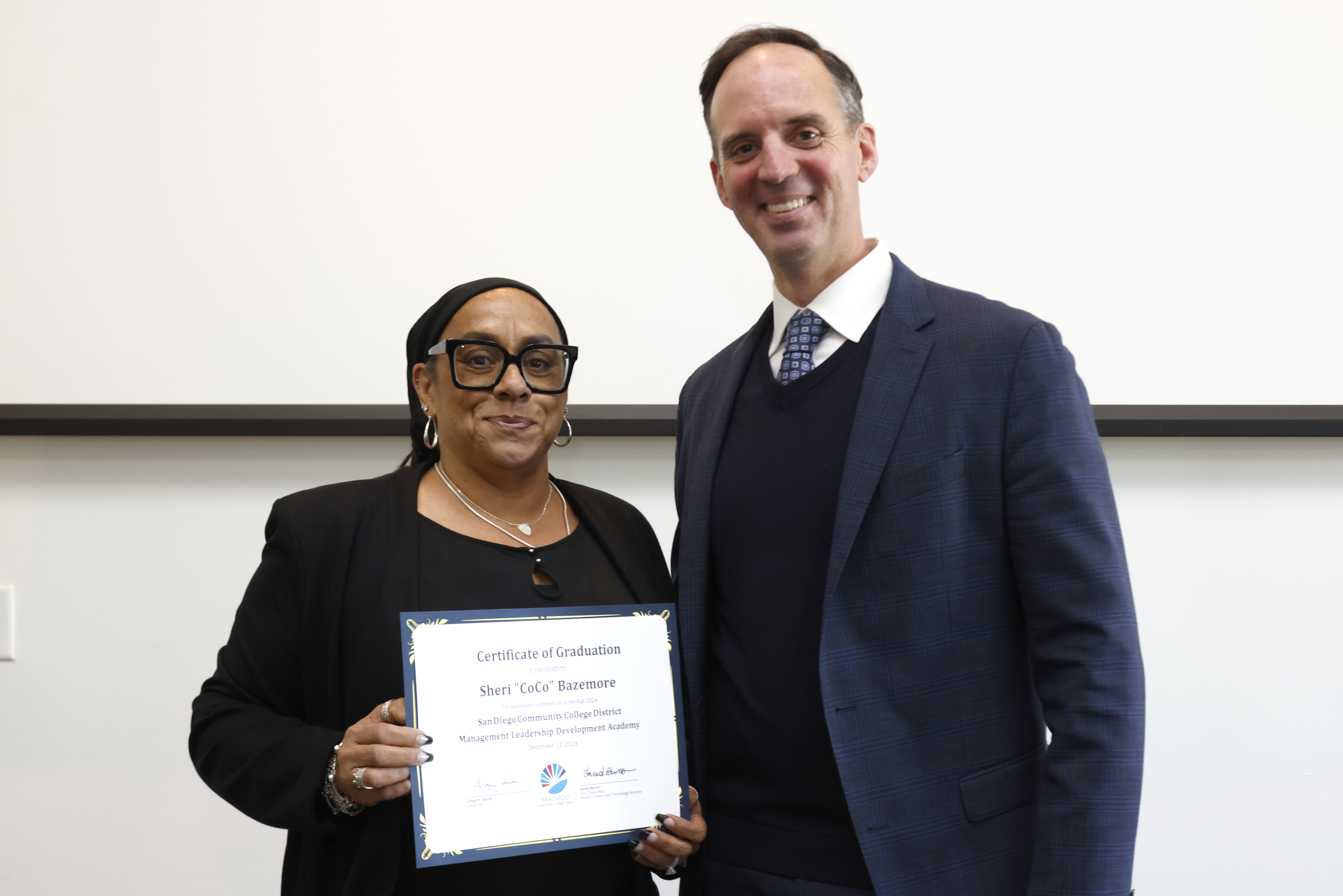 
CoCo Razemore receives her certificate.
