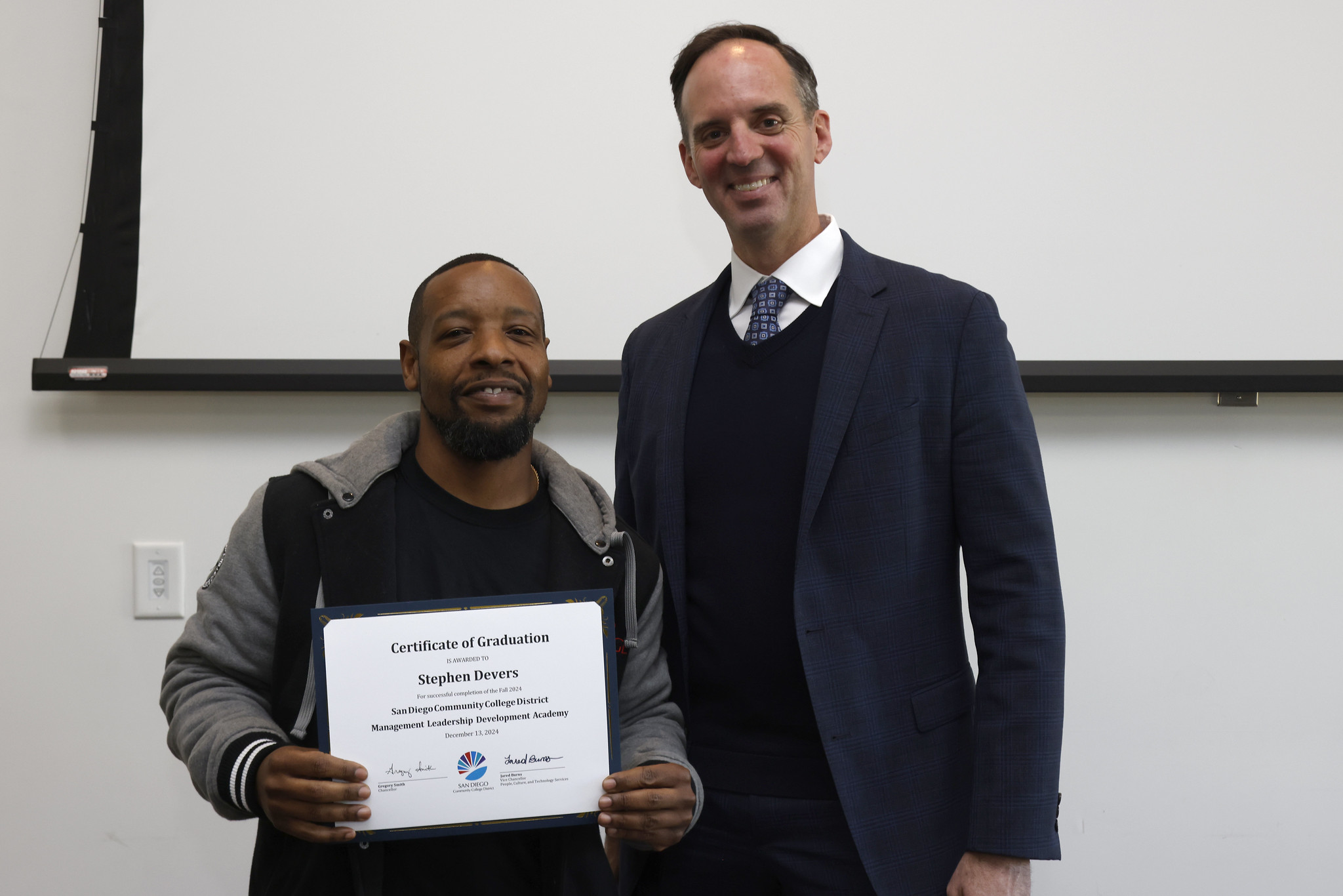 
Stephen Devers receives his certificate.
