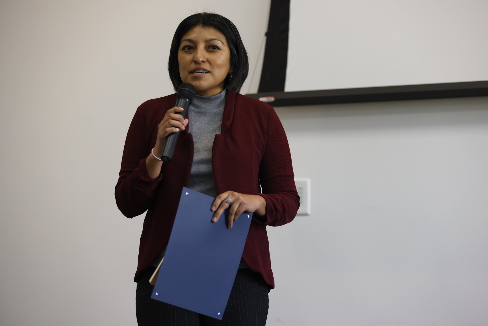 
Olivia Flores receives her certificate.
