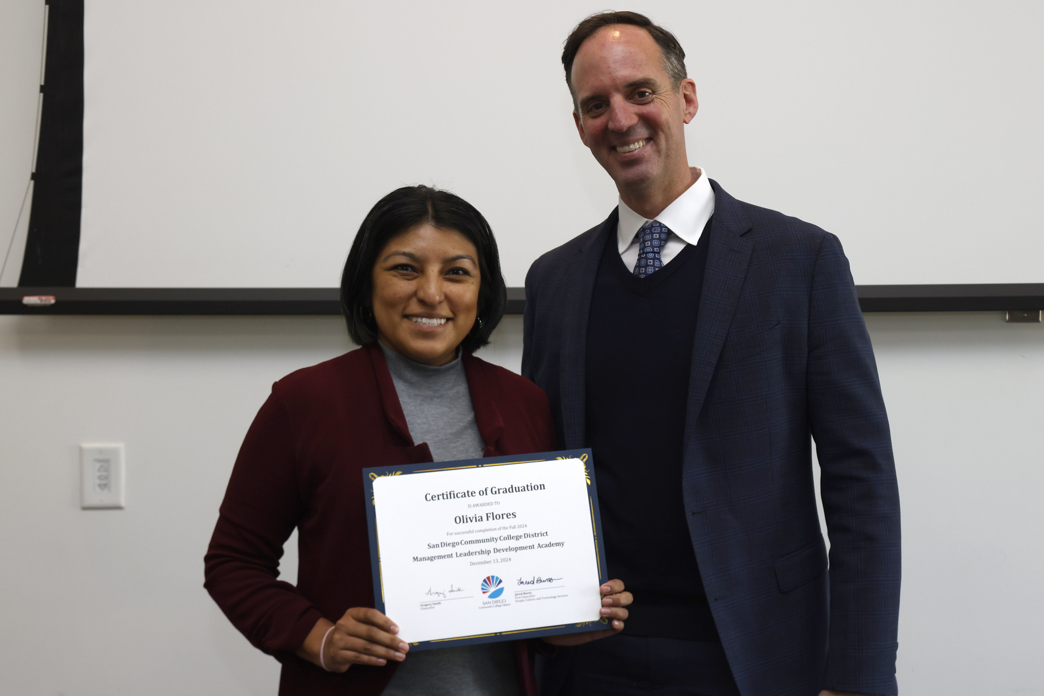 
Olivia Flores receives her certificate.
