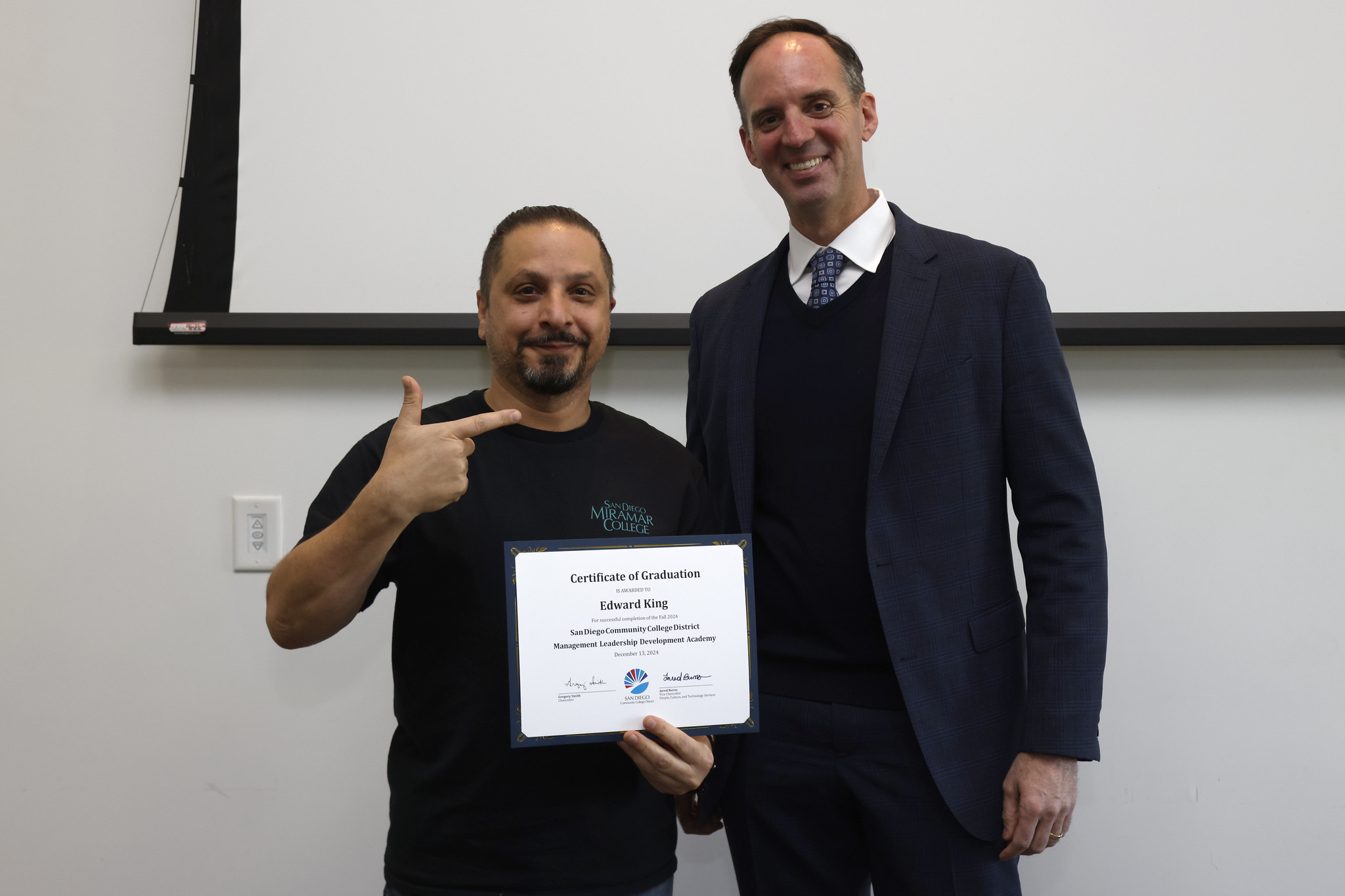 
Edward King receives his certificate.
