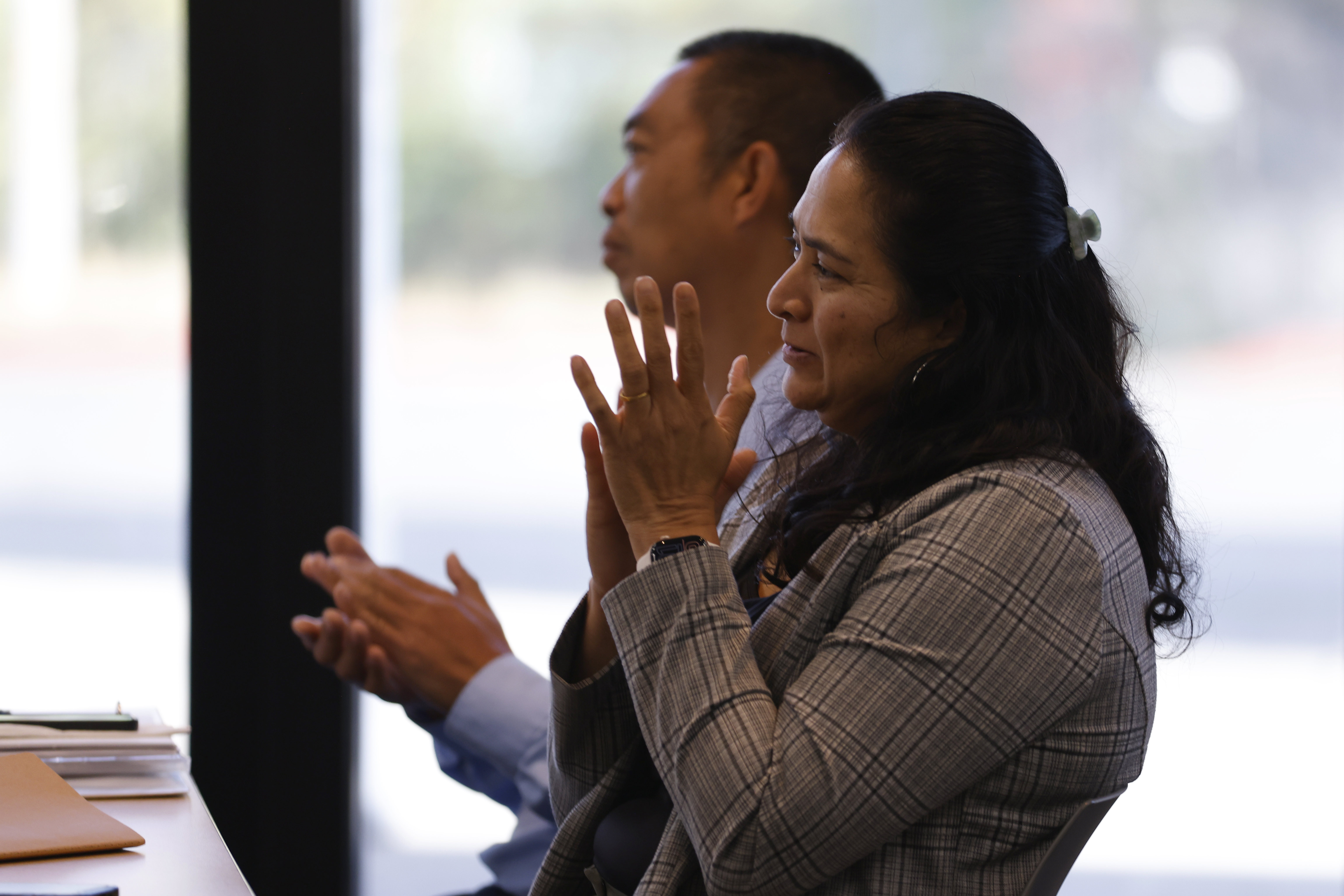 
Rashmi Kamath applauds.
