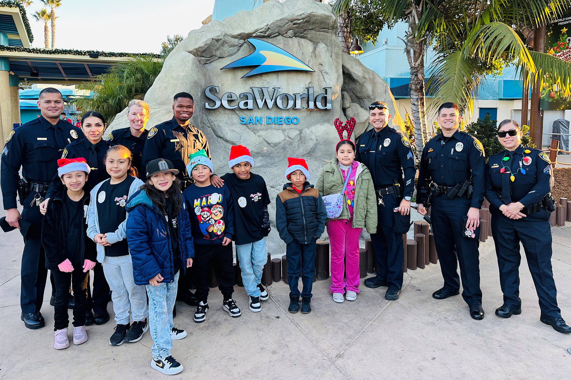 College Police with local children at SeaWorld.