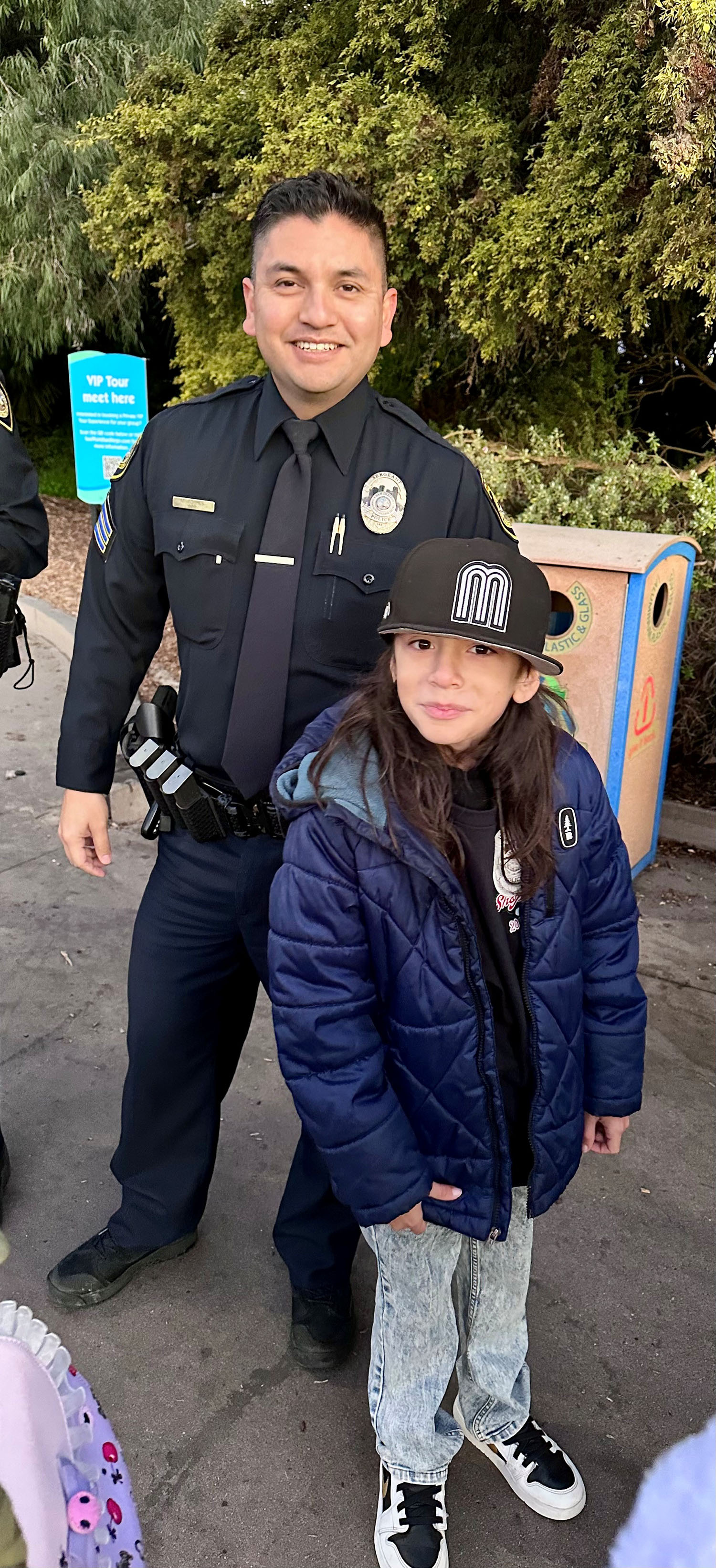 College Police with local children at SeaWorld.