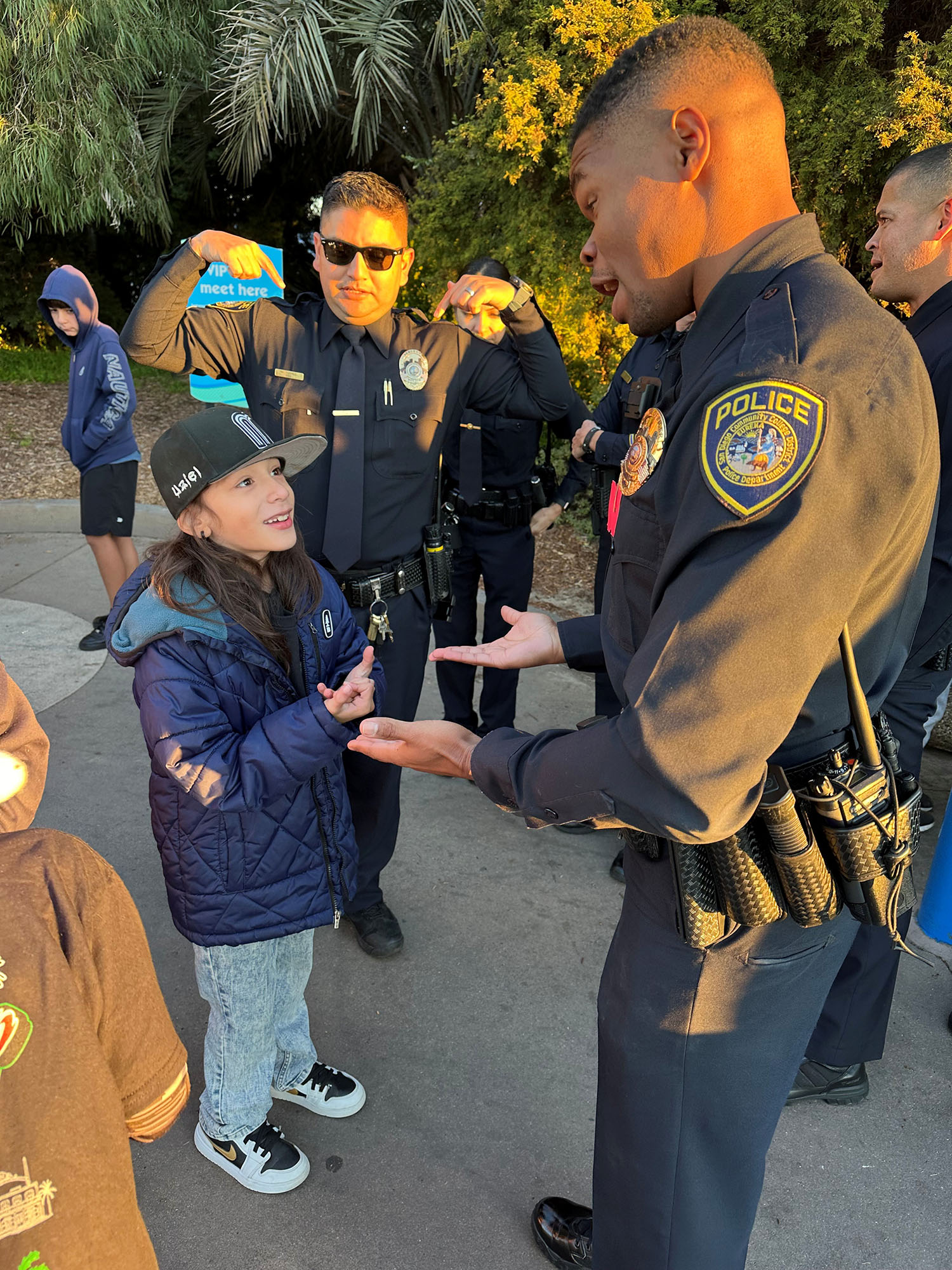 College Police with local children at SeaWorld.