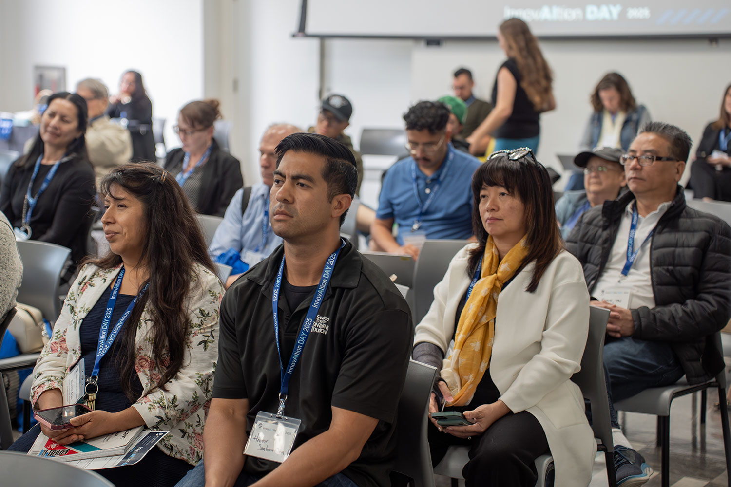 
The audience listens to the panel.
