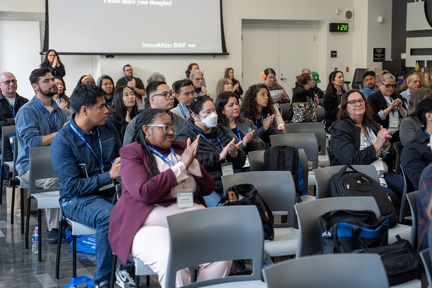 
The audience applauding.
