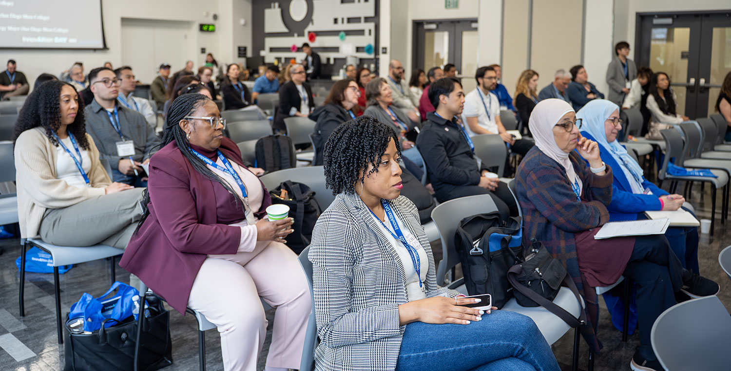 
The audience listening to the panel
