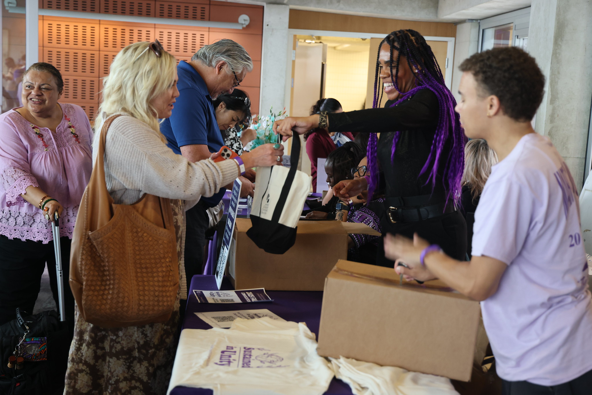 
People entering convocation received t-shirts and a canvas bag.
