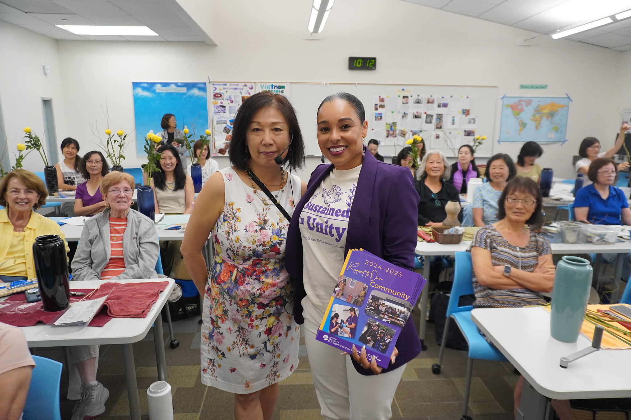 
President Tina King with and instructor in her flower arranging classroom. 
