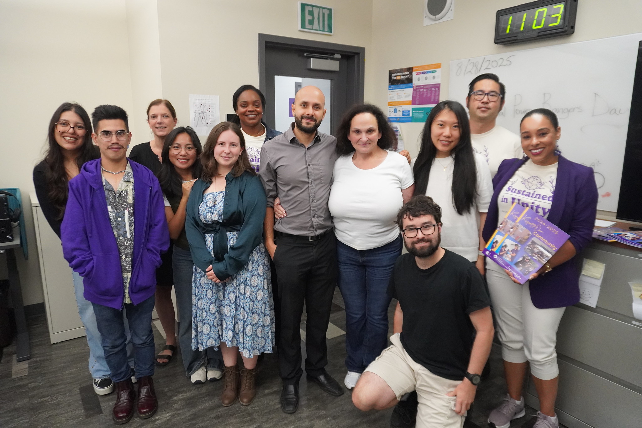 
College of Continuing Education President Tina King with 11 employees in a classroom.
