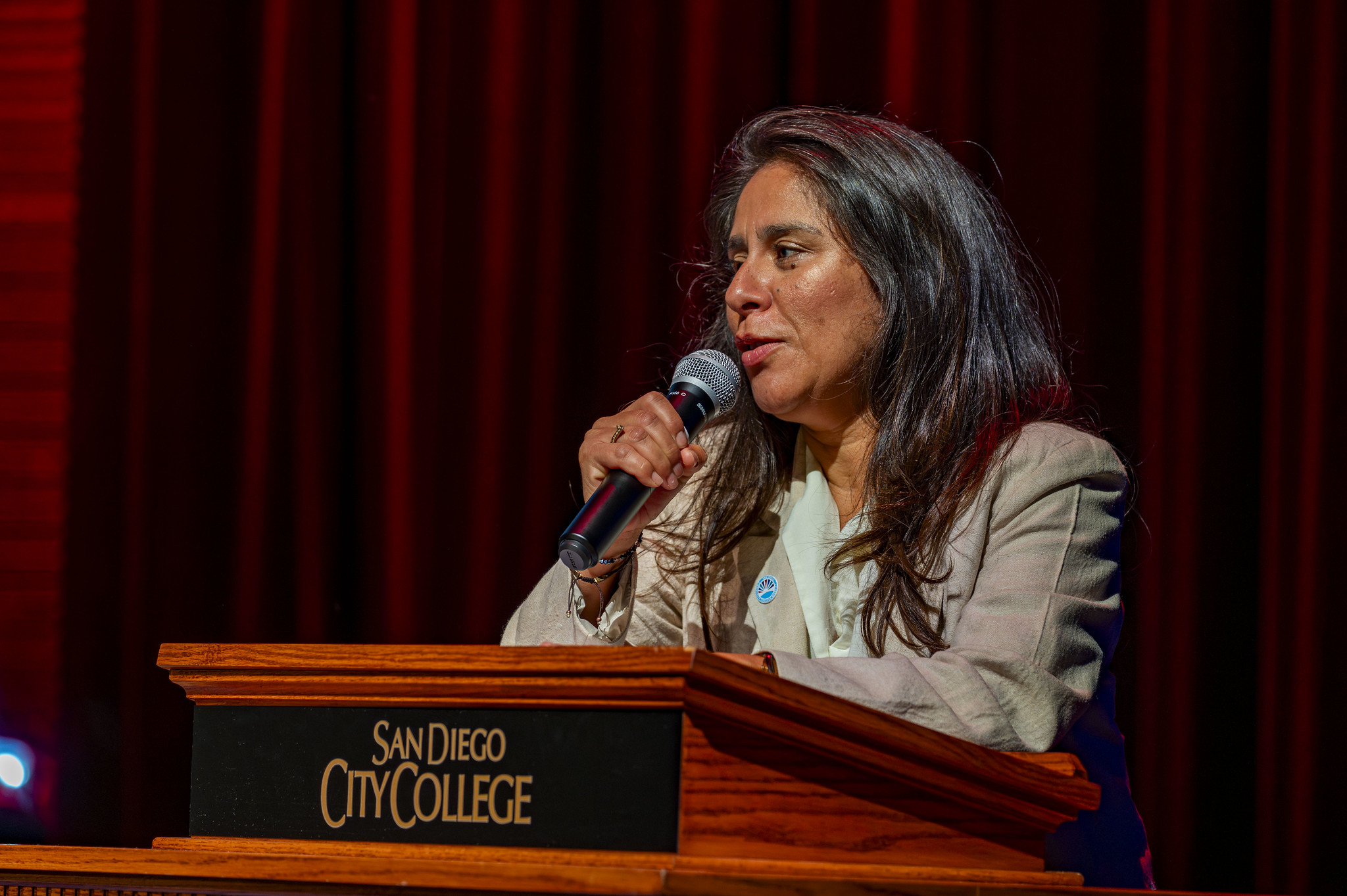 
Trustee Geysil Arroyo addresses the audience.
