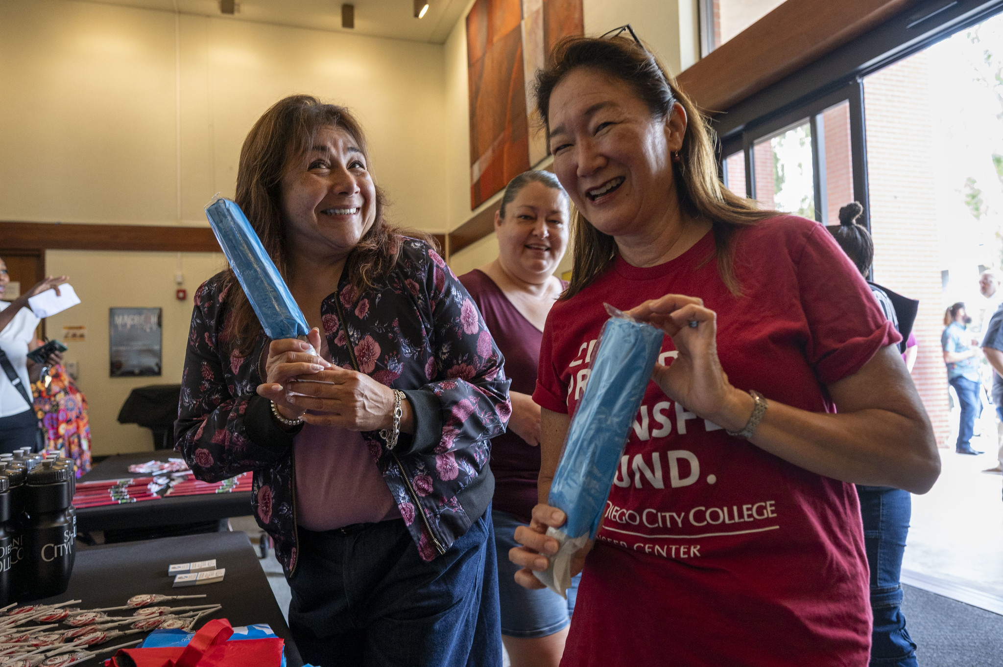 
Two employees recieve their district umbrellas.
