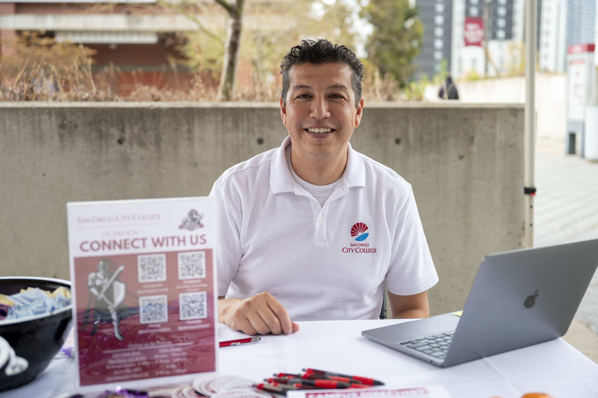 
Adan Sanchez working at a Welcome Tent.
