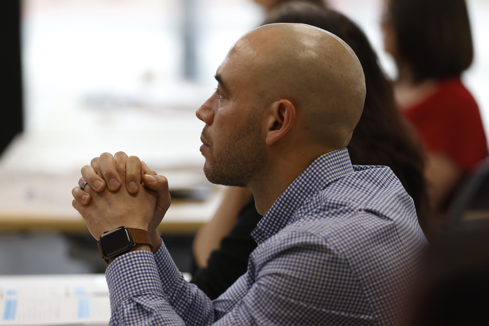 
Tomas "Papo" Rosas in the audience listening at the event.
