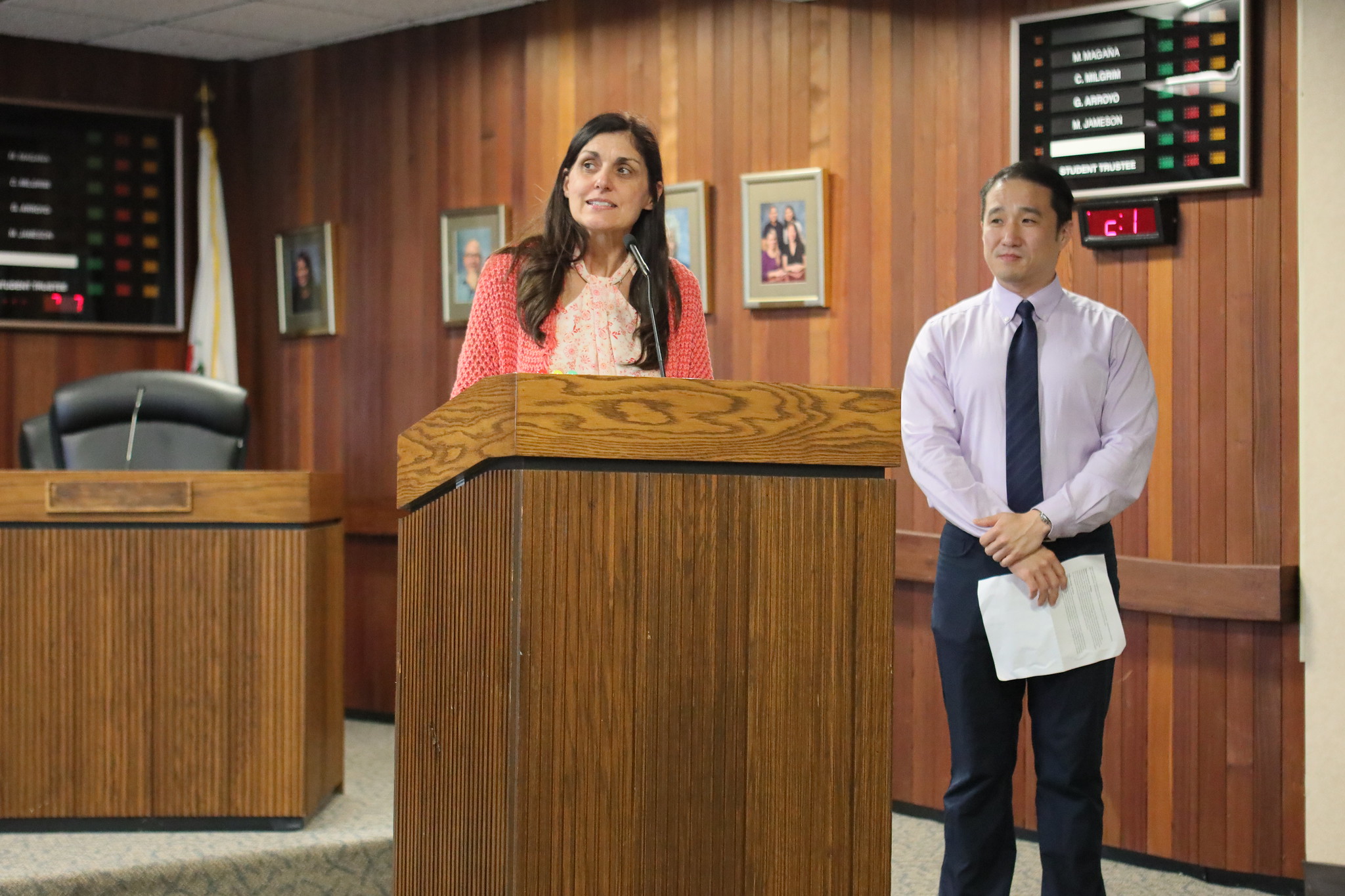 
Deans Shelley Hess and Victor Devore present certificates at the event.
