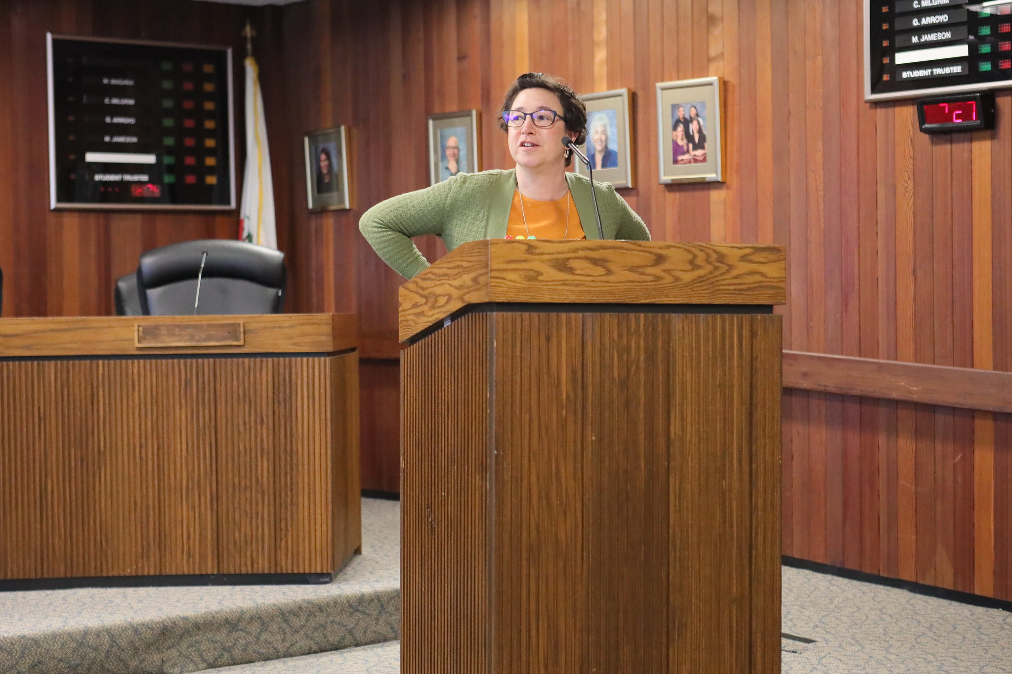 
Amertah Perlman speaks at a podium.
