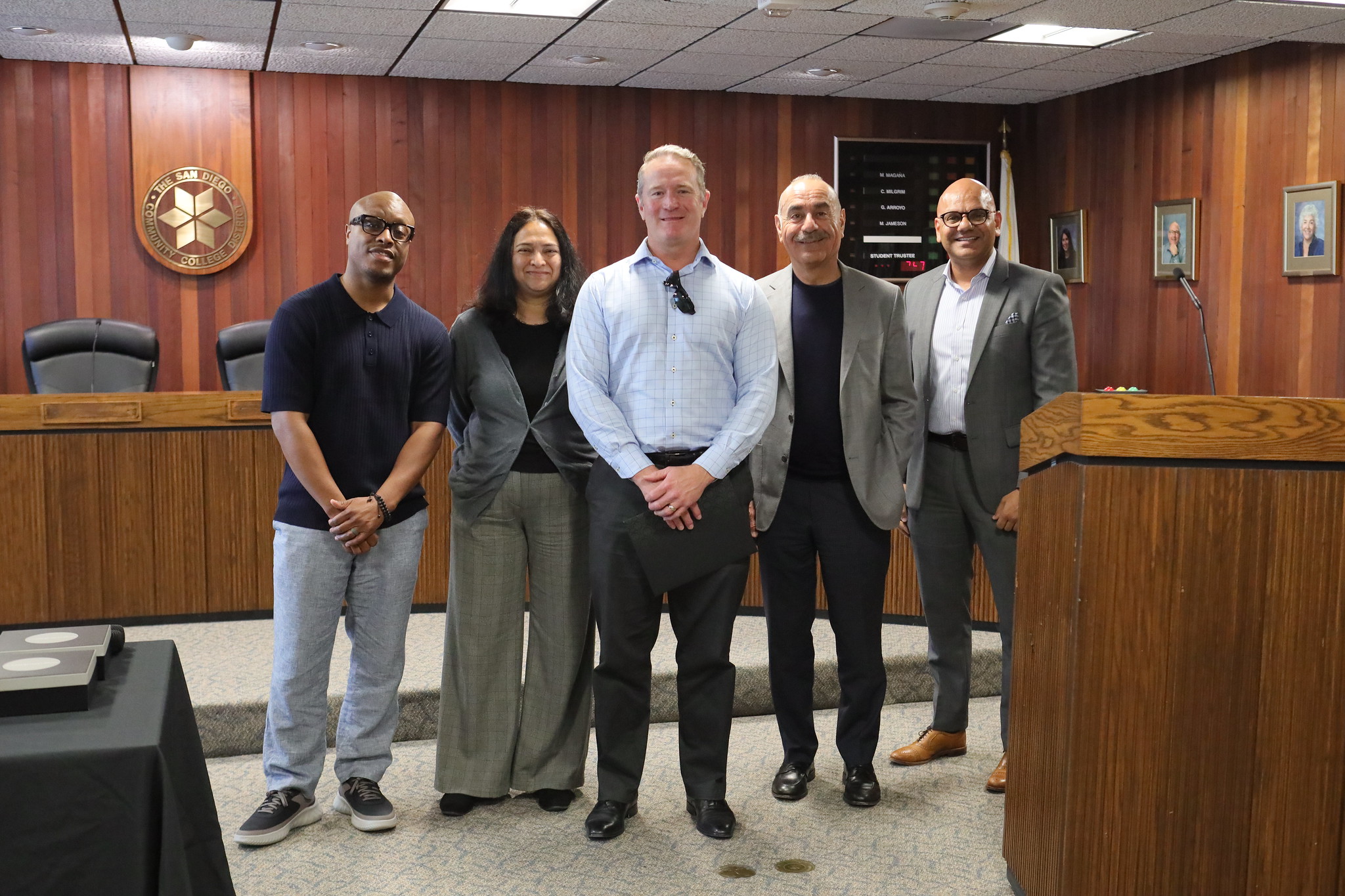 
Five people at the service awards event

