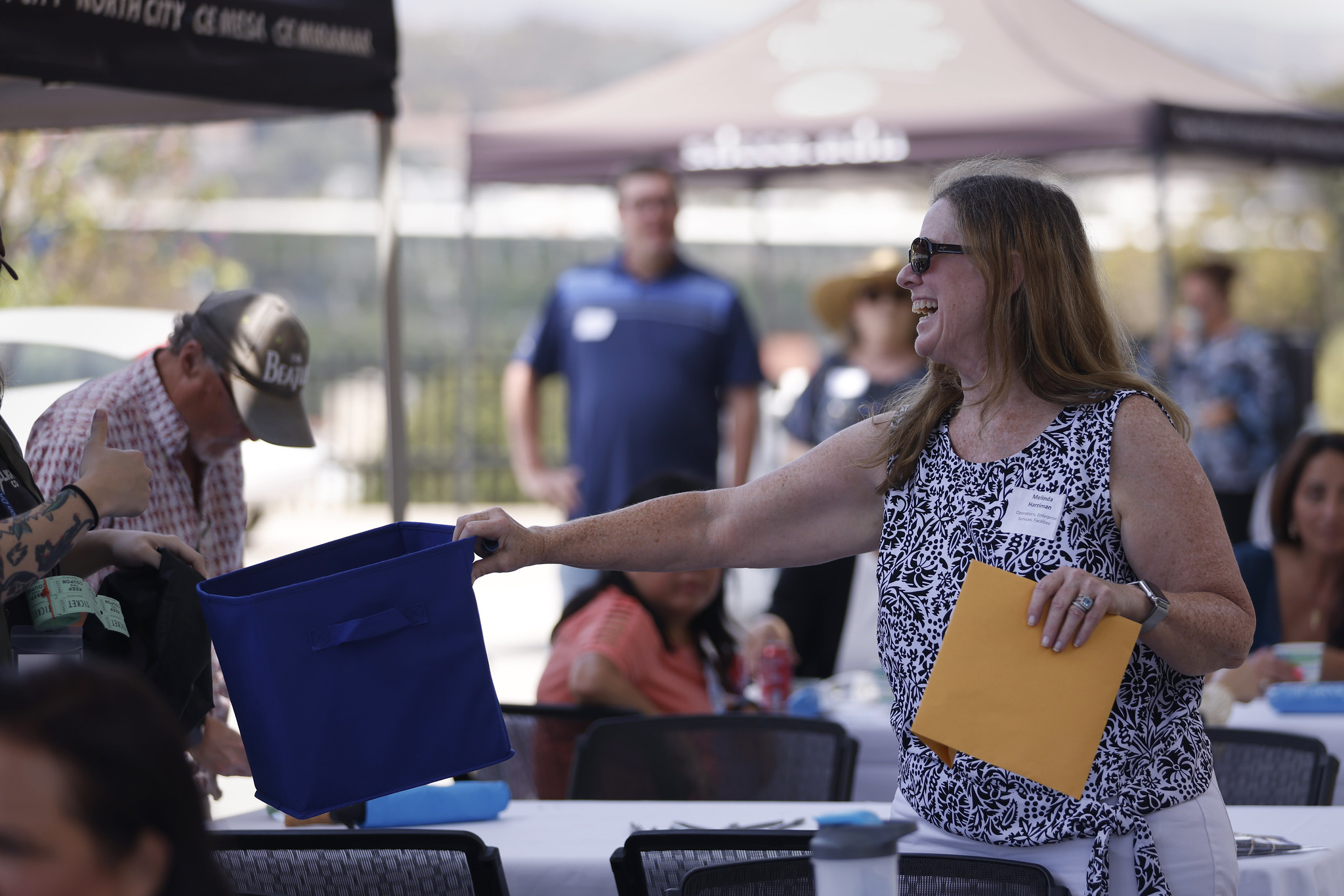 
Dr. Melinda Harriman collects raffle tickets.
