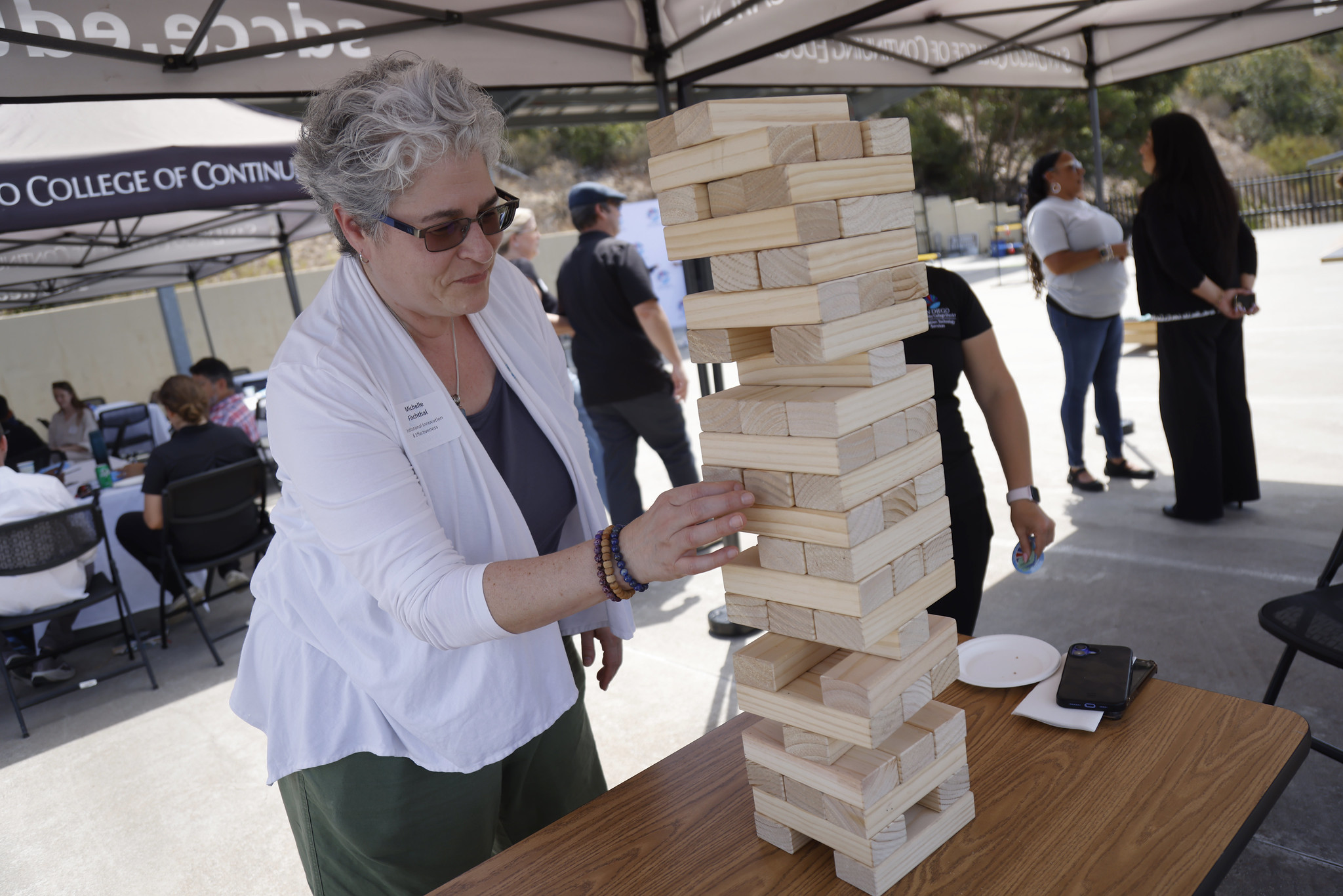 
Vice Chancellor Michelle Fischthal tries out Jenga.
