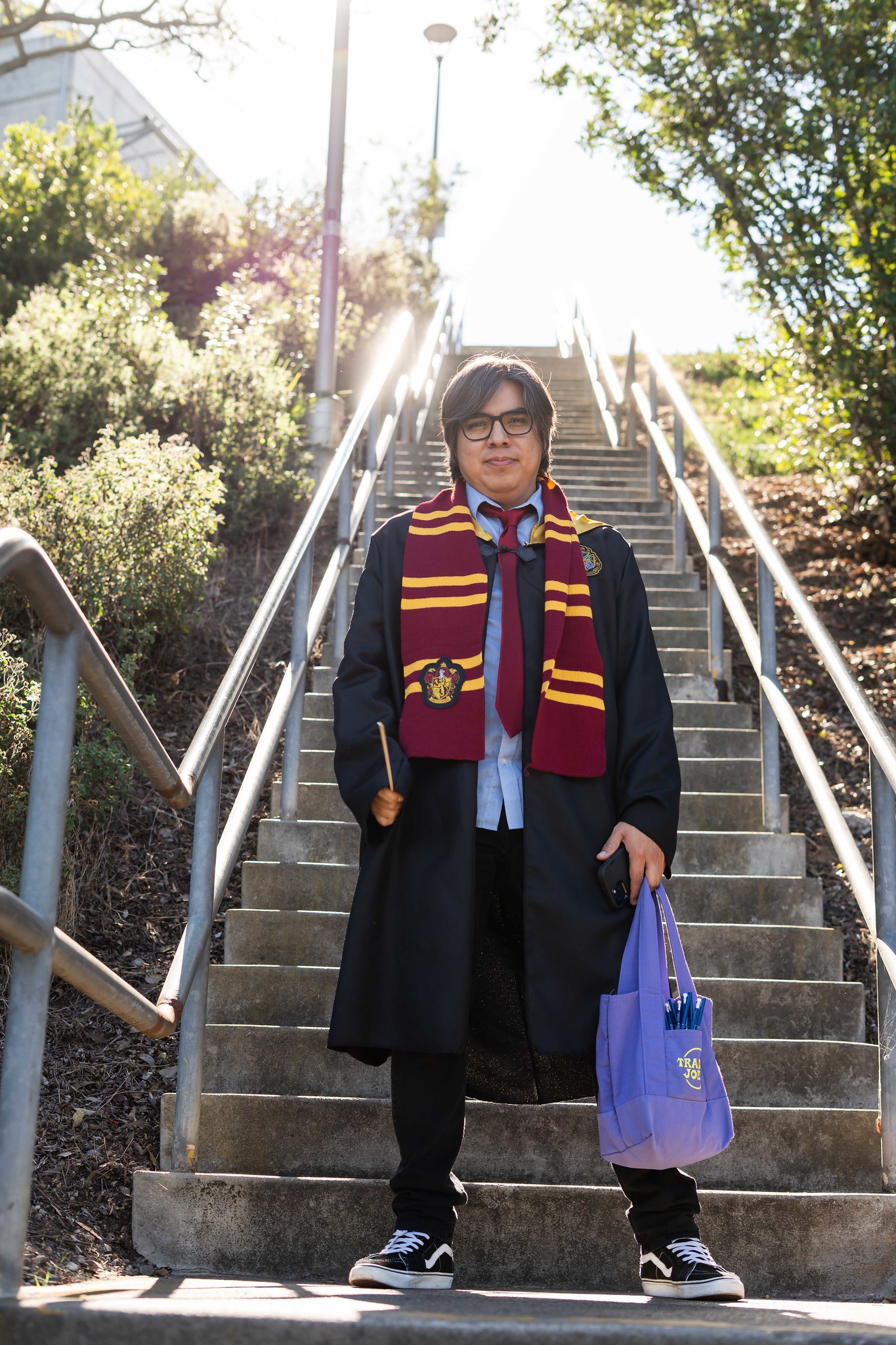 
A man dressed as Harry Potter.
