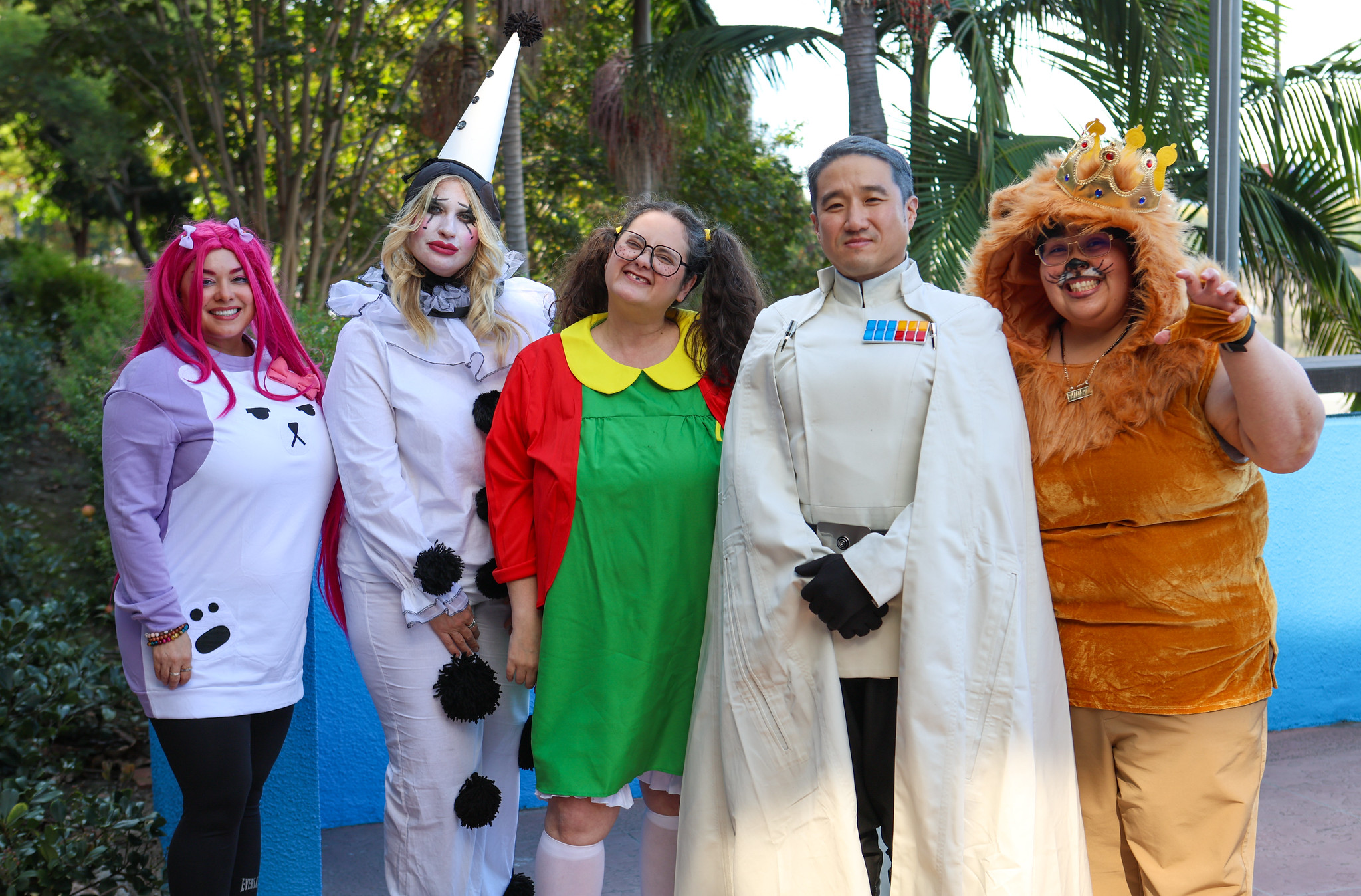
5 people in various Halloween costumes at the District Office.
