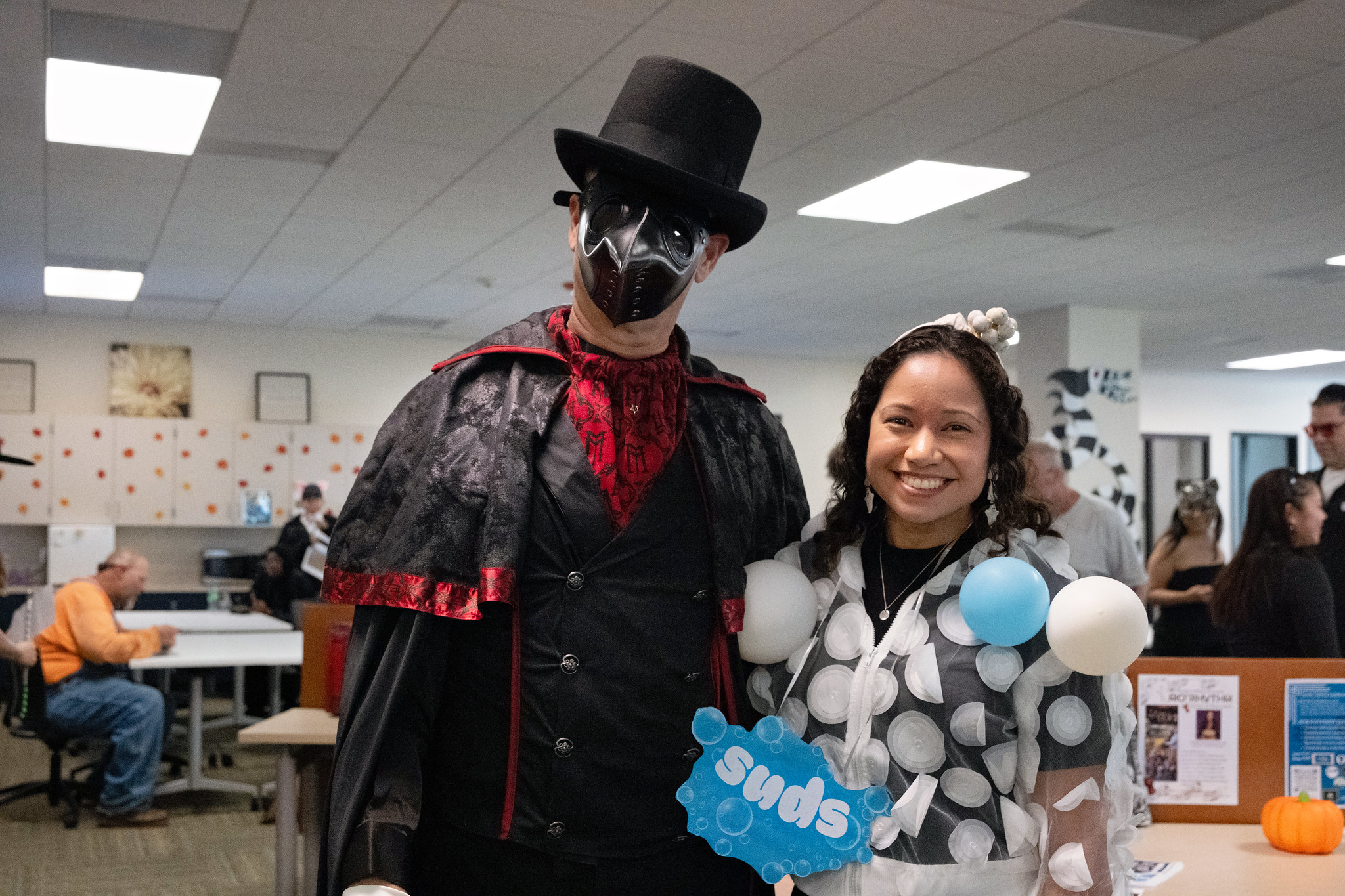 
Two people in costumes at Miramar College.
