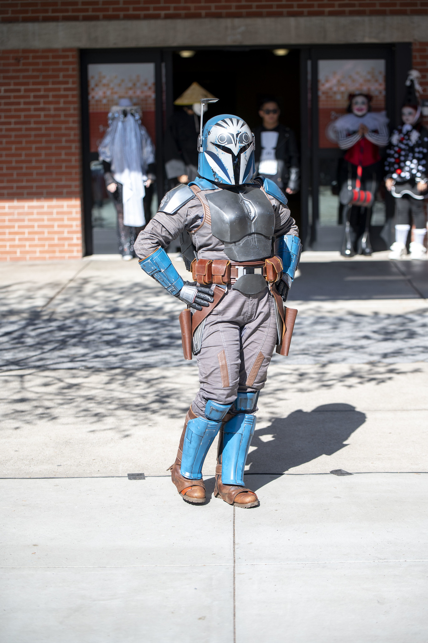 
A woman in a Mandelorian costume.
