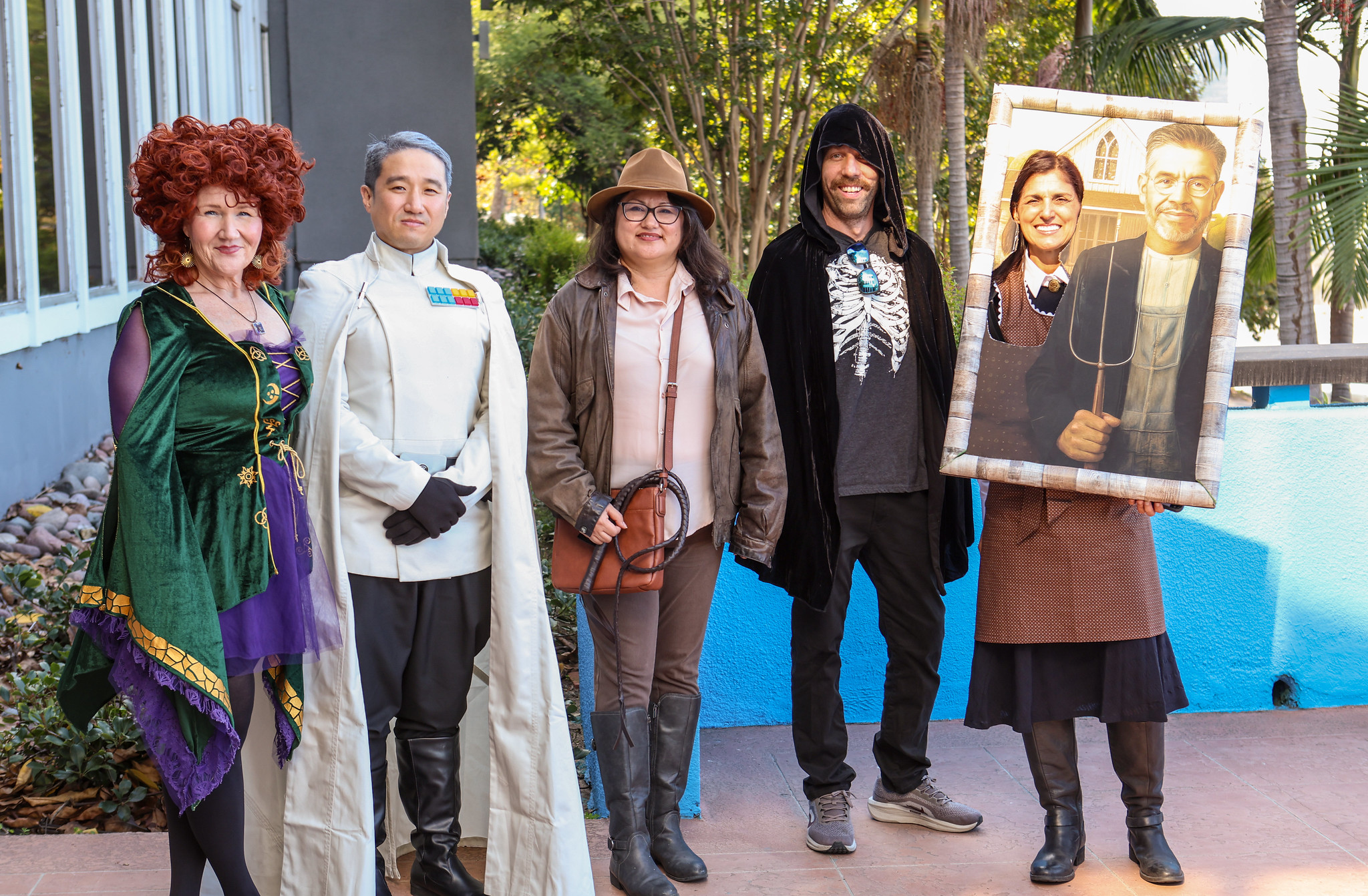 
Five people in various Halloween costumes at the district office.
