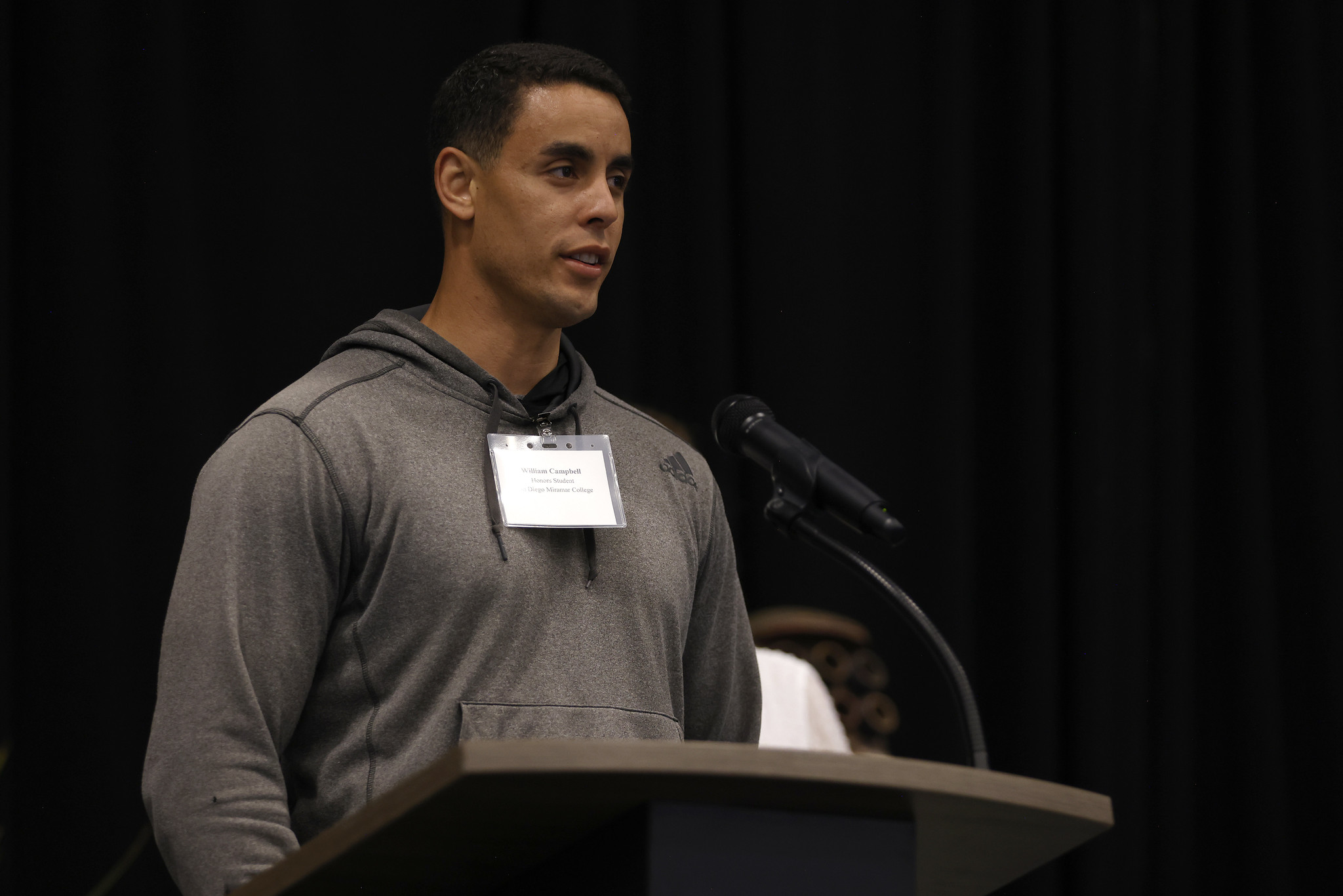 
A student speaks at the podium
