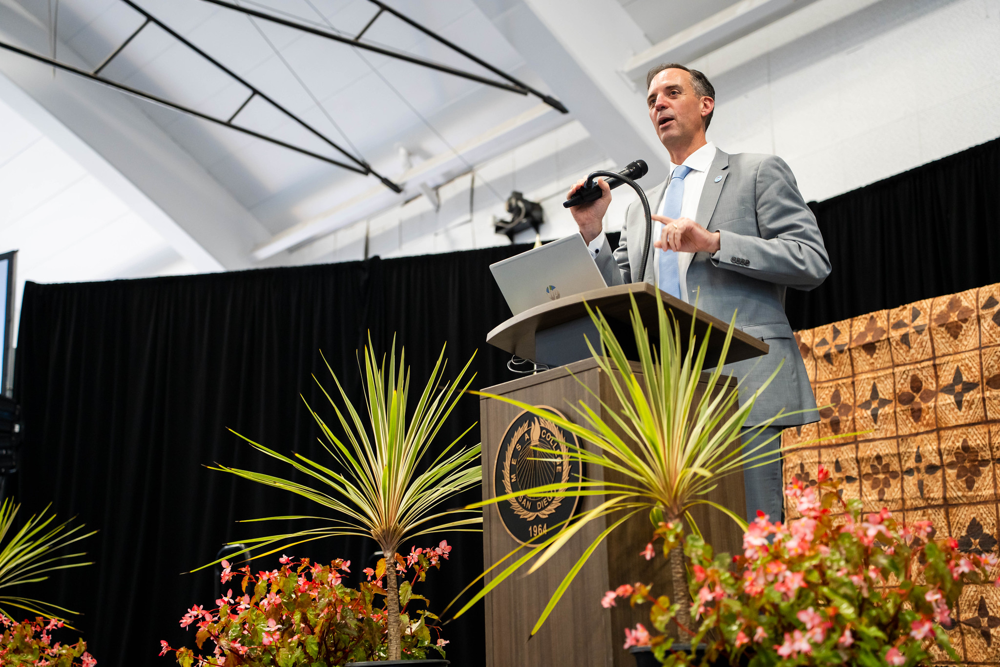 
Chancellor Gregory Smith on stage addressing the audience.
