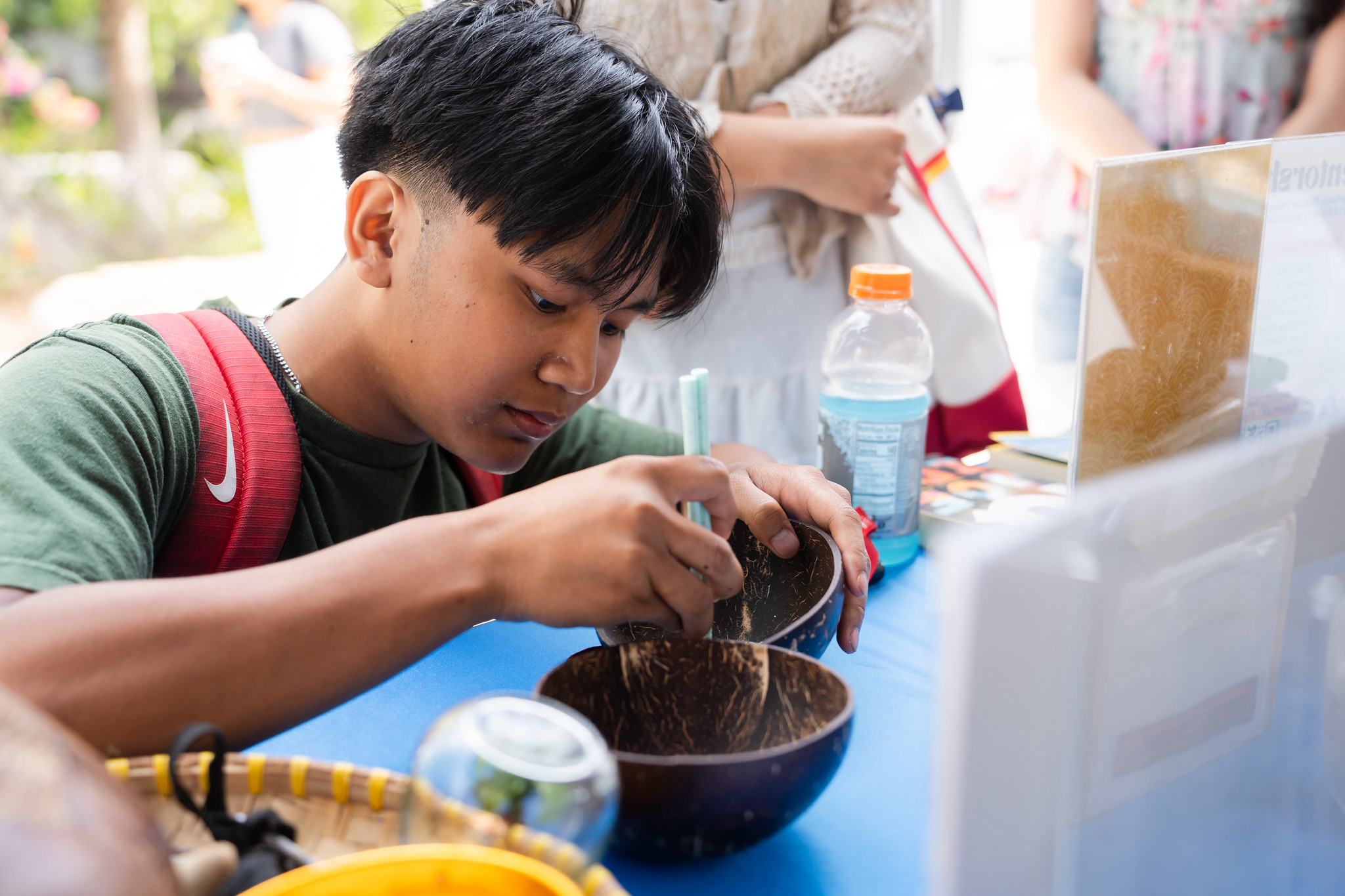 
A student at a welcome tent.
