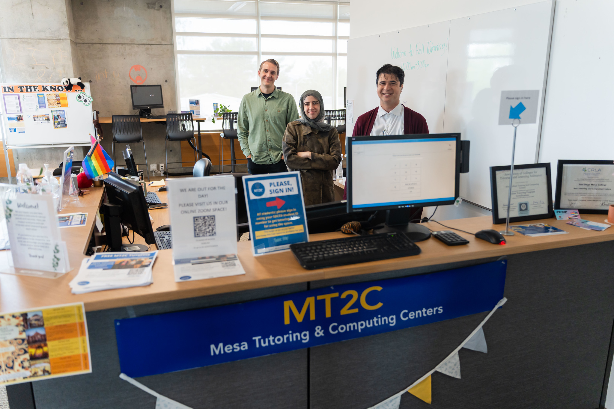 
Three employees at the Tutoring and Computing Center.
