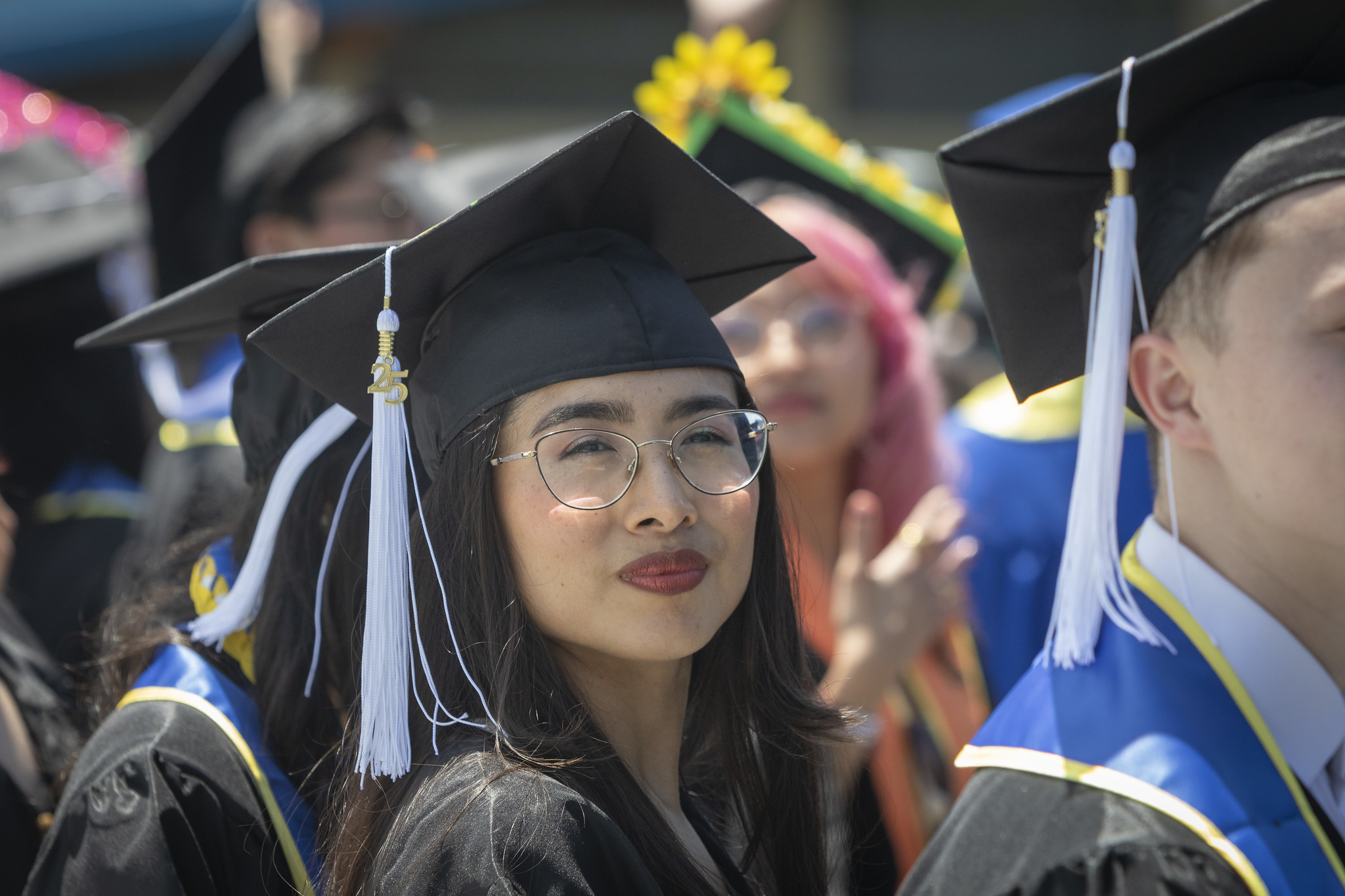 
A graduate seated in the audience.
