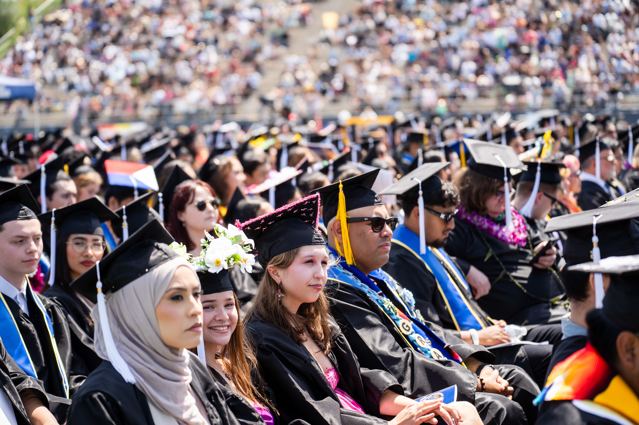 
The crowd of graduates seated at commencement.
