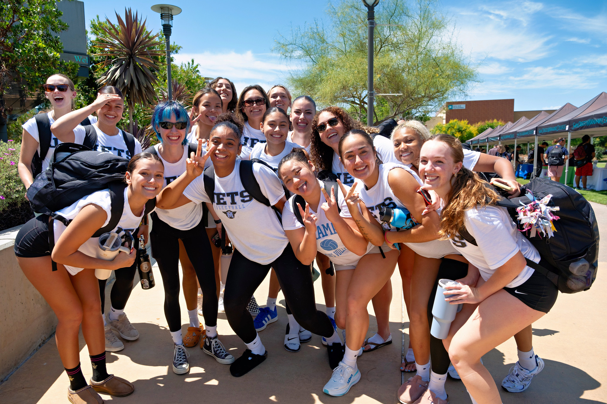 
Sixteen people from the Women's Volleyball team gather for a group photo.&nbsp;
