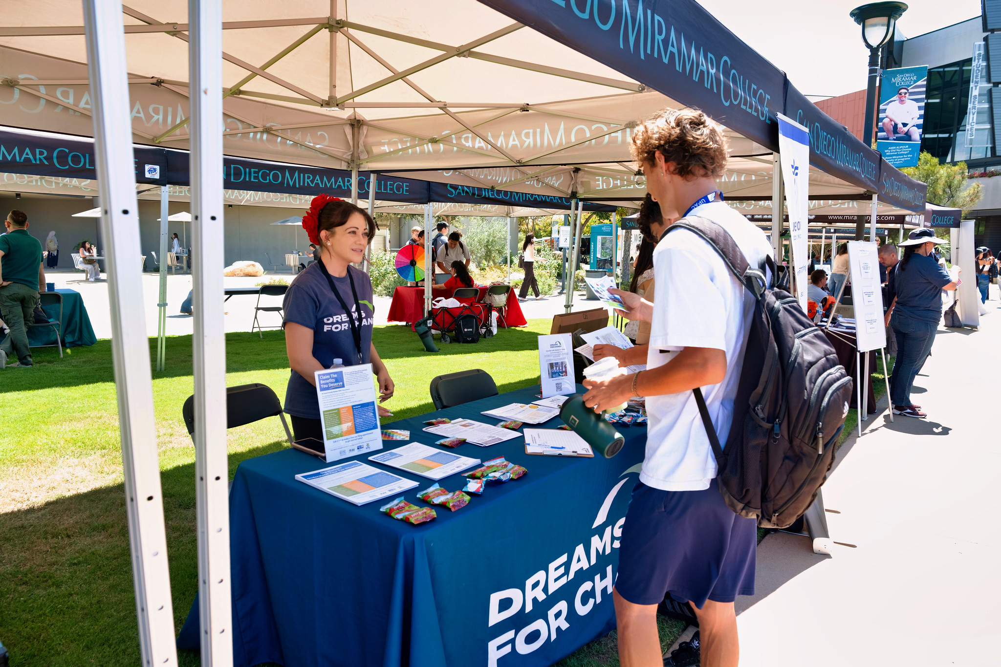 
A student stops by the dreams for change booth.
