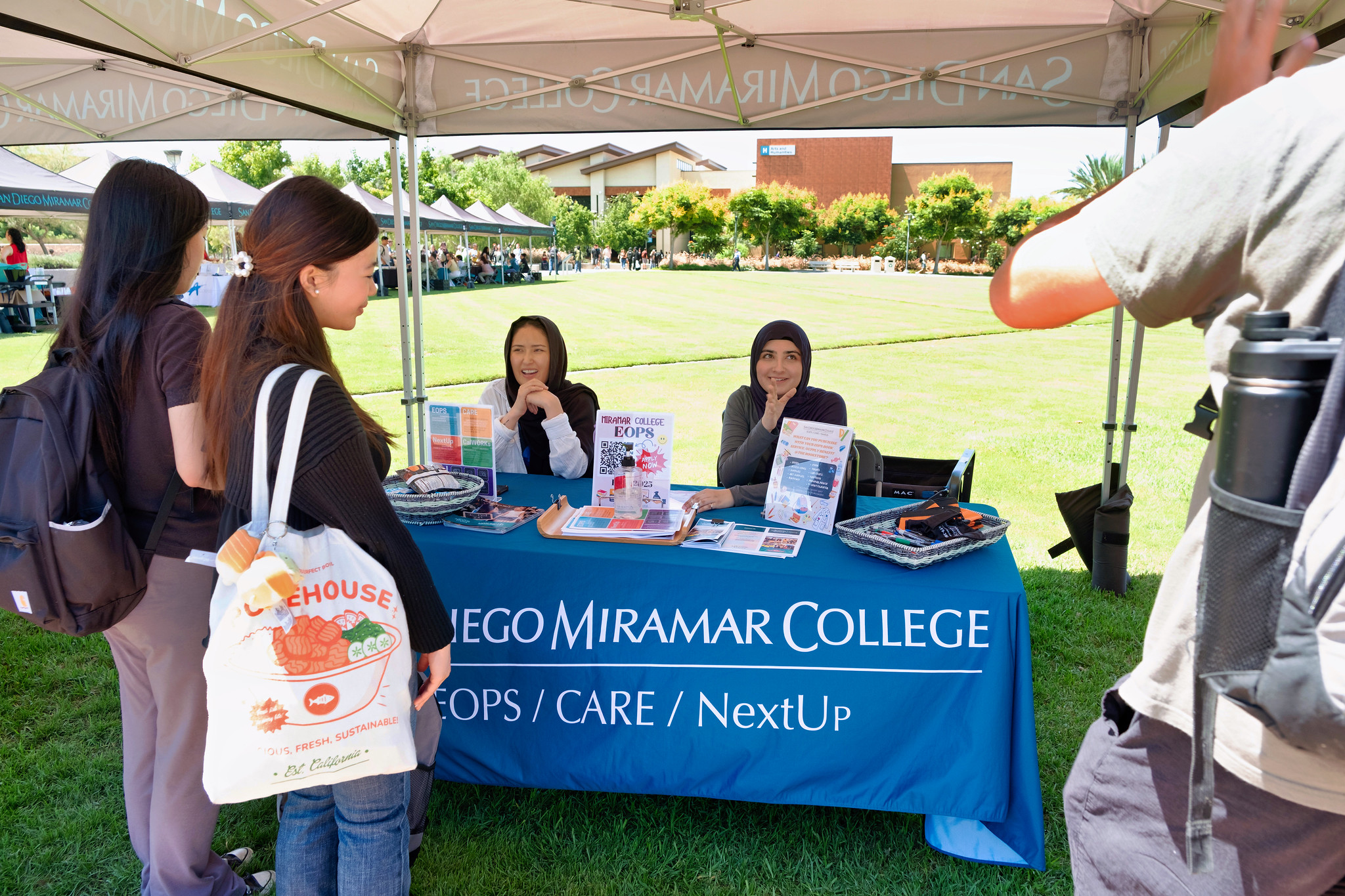 
Students stop by the booth for extended opportunity programs and services.
