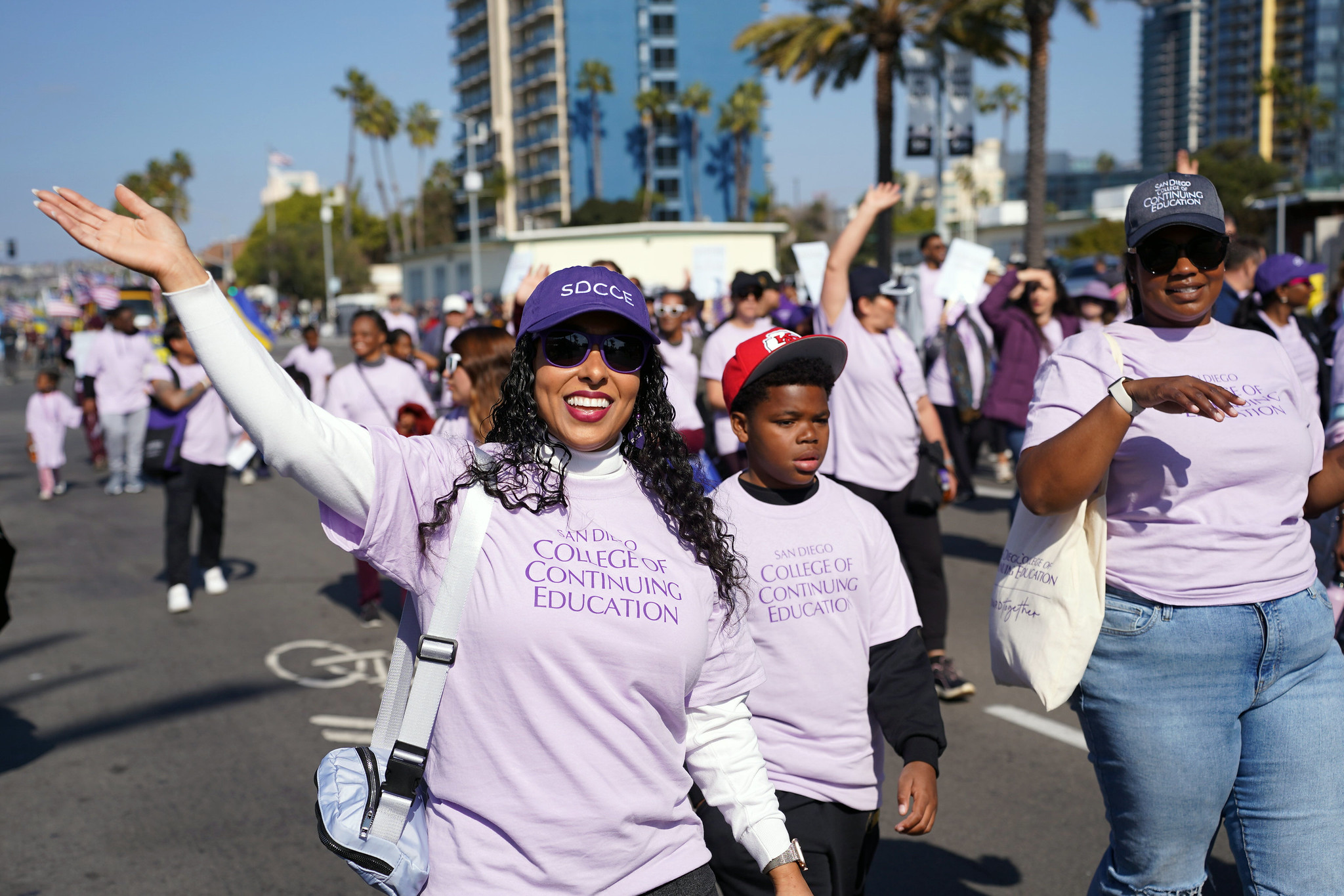 College of Continuing Education President Tina King waves while walking in the parade.
