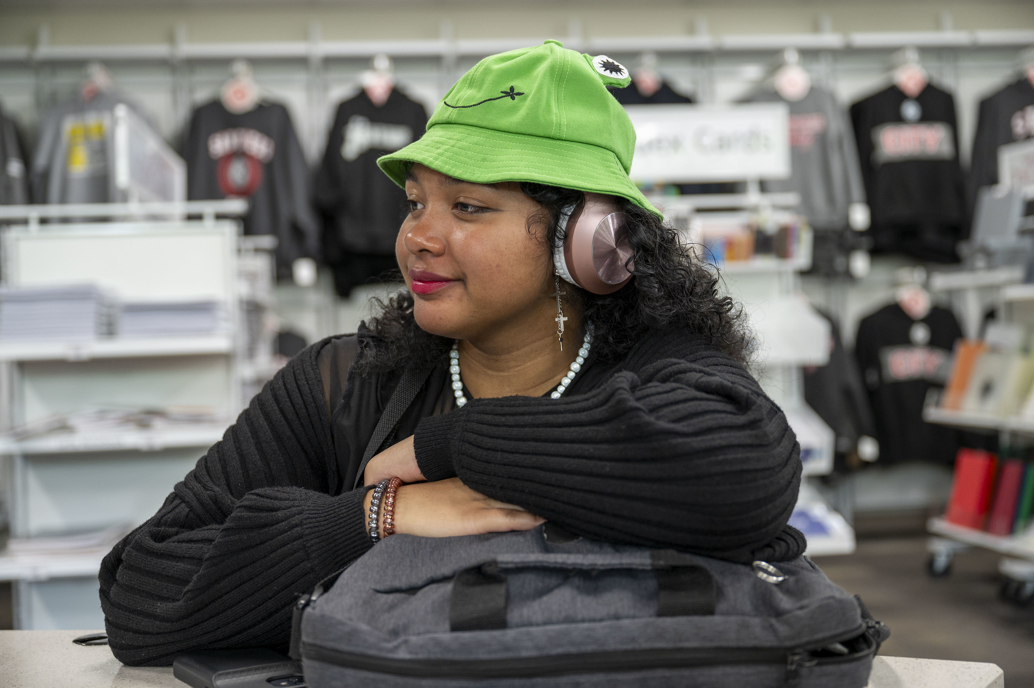 
A student waiting at the at City College bookstore.
