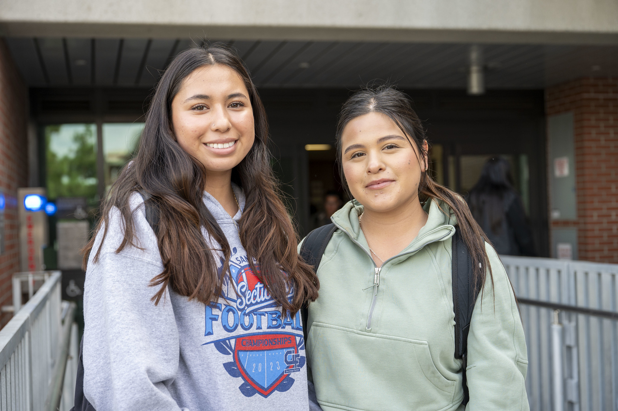 
Two students hanging out at City College.

