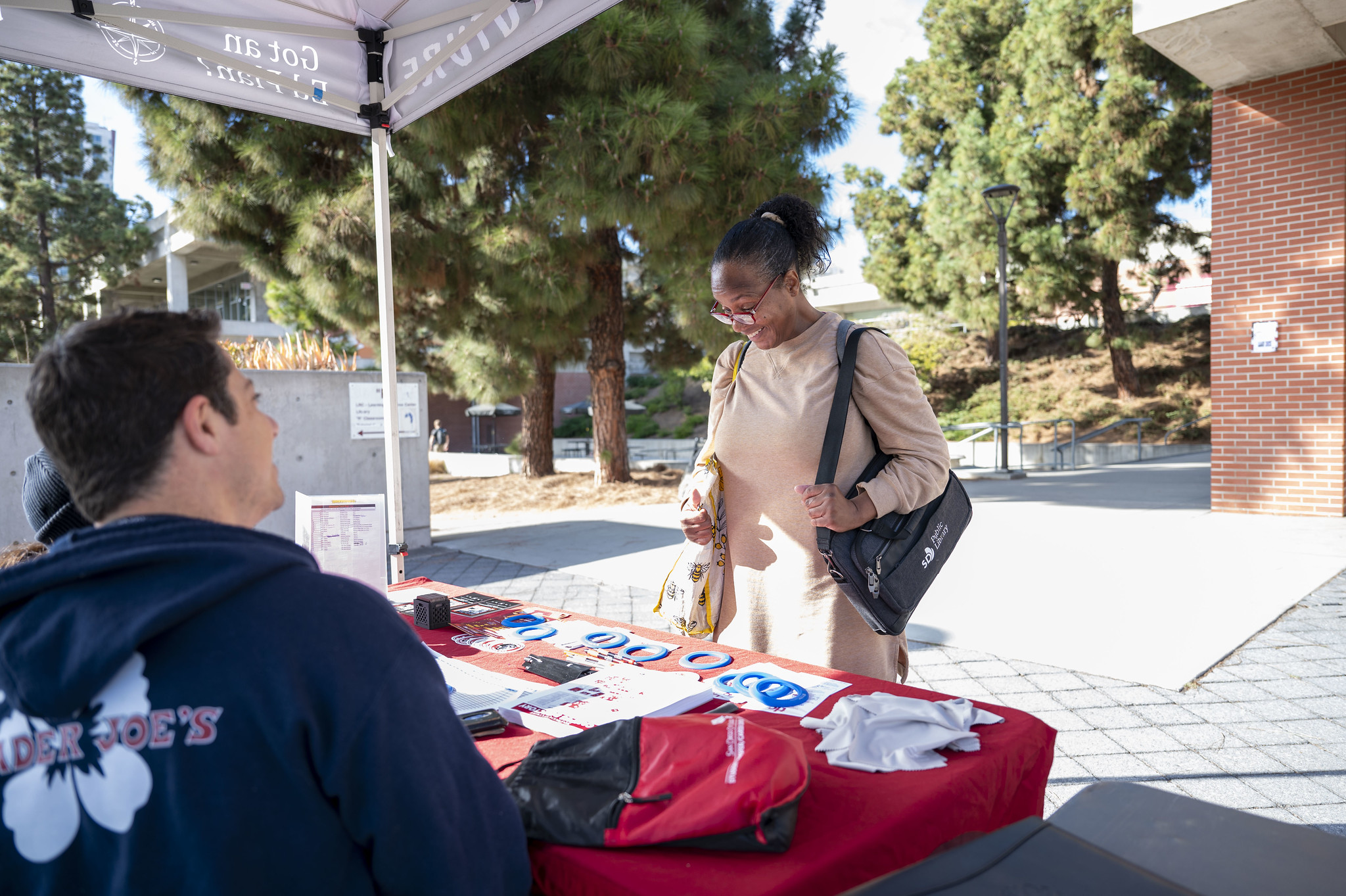 
A student stops by a red booth at City College.
