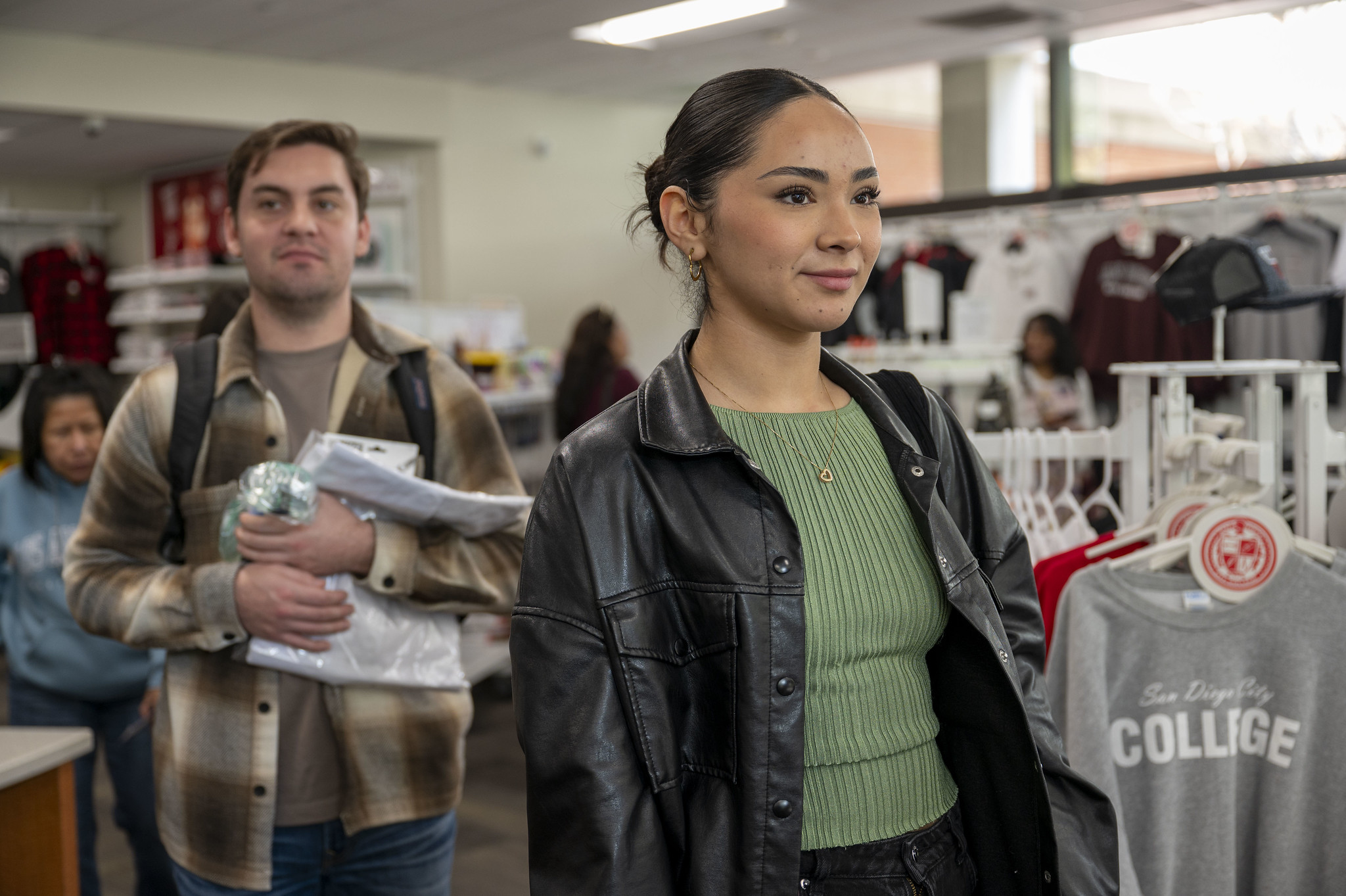 
Two students in line at the at City College bookstore.
